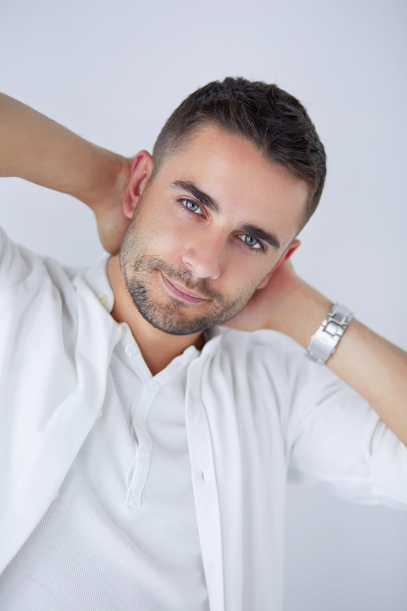 young business man standing isolated on white background