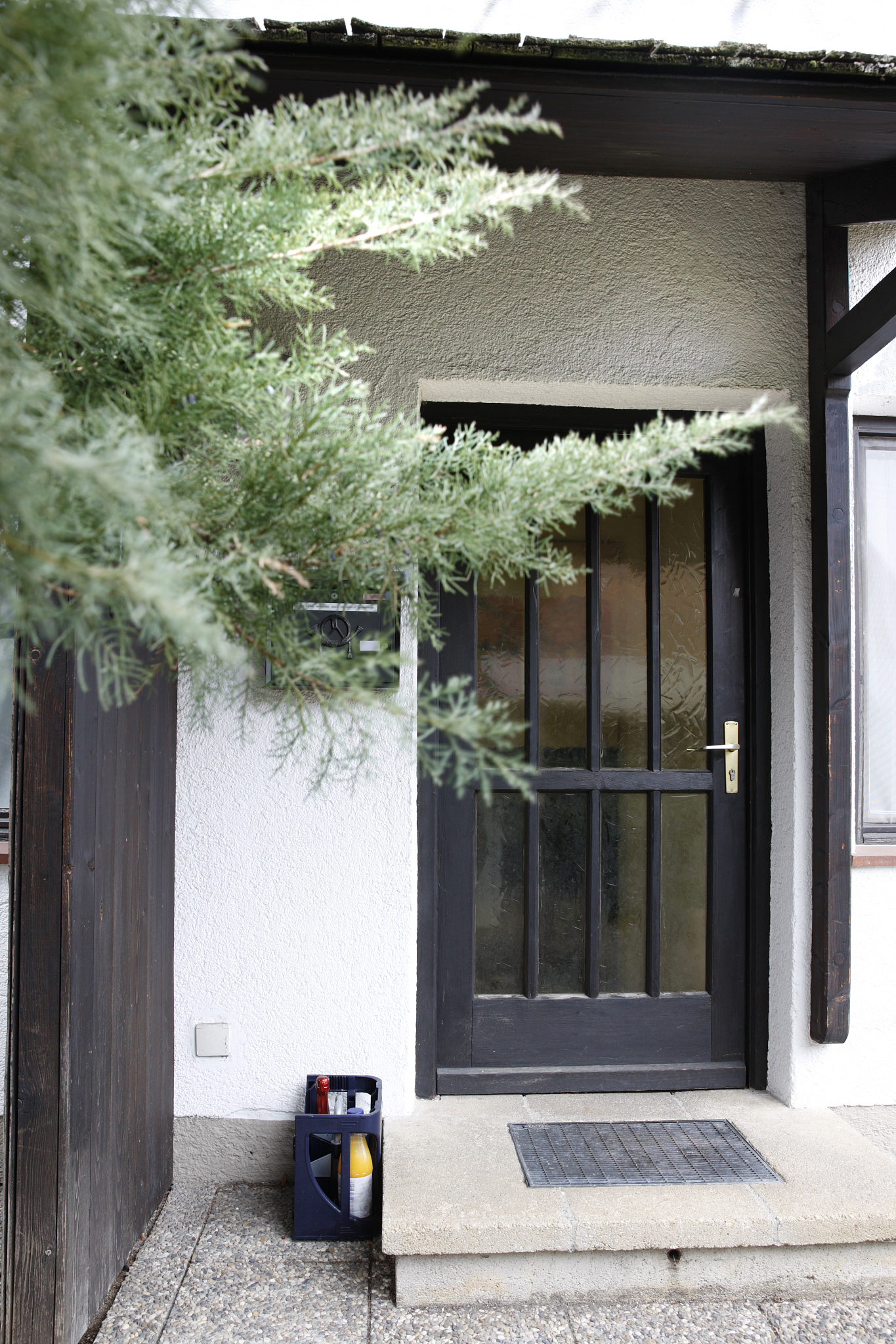 brown front door one third glass window