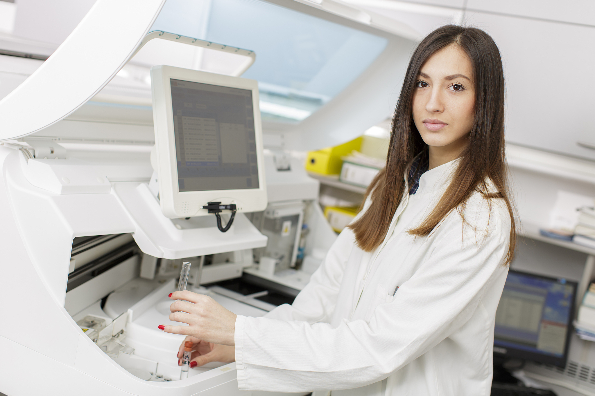 young woman in the modern medical laboratory