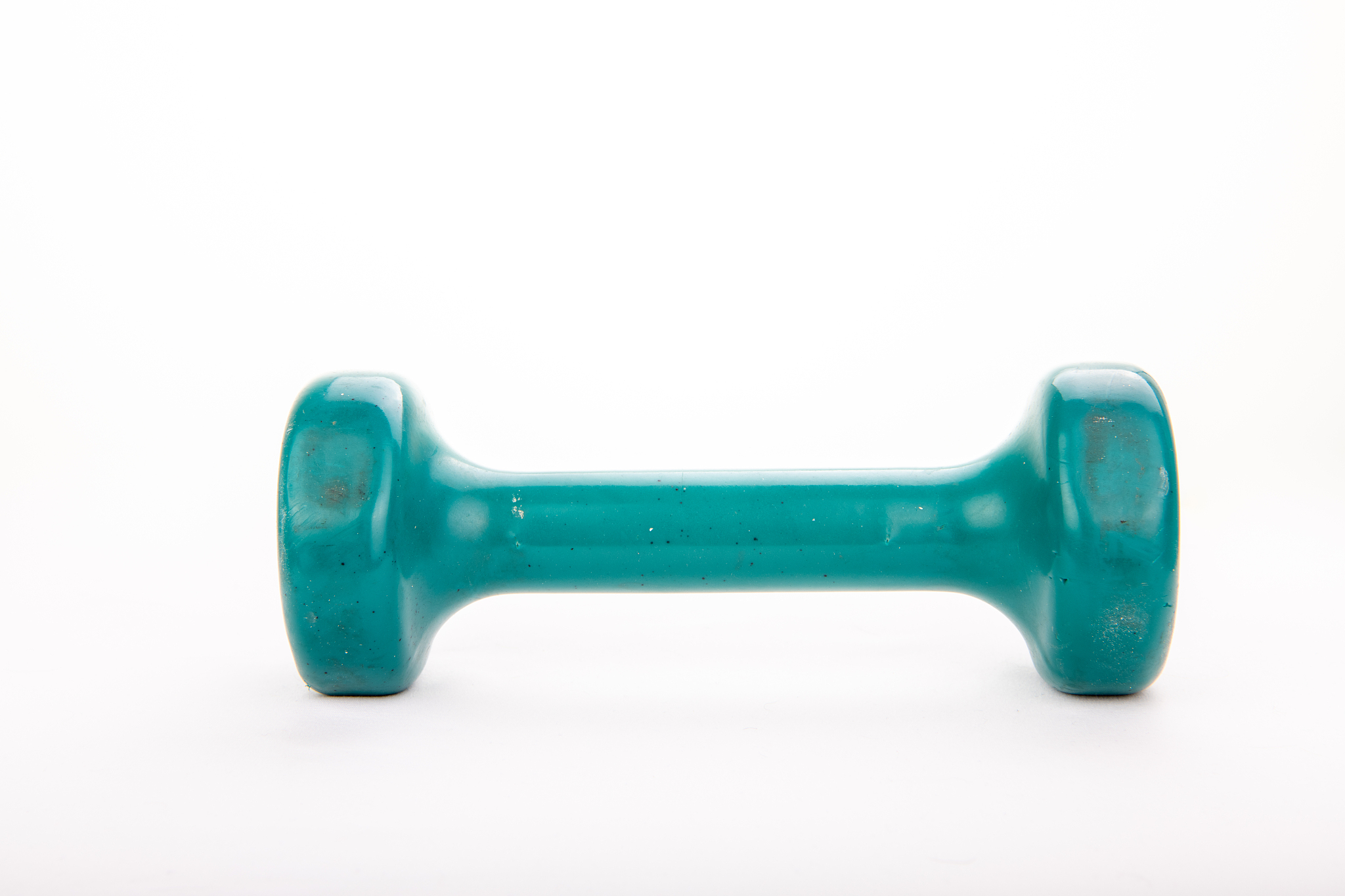 close up of a worn, used, five pound barbell