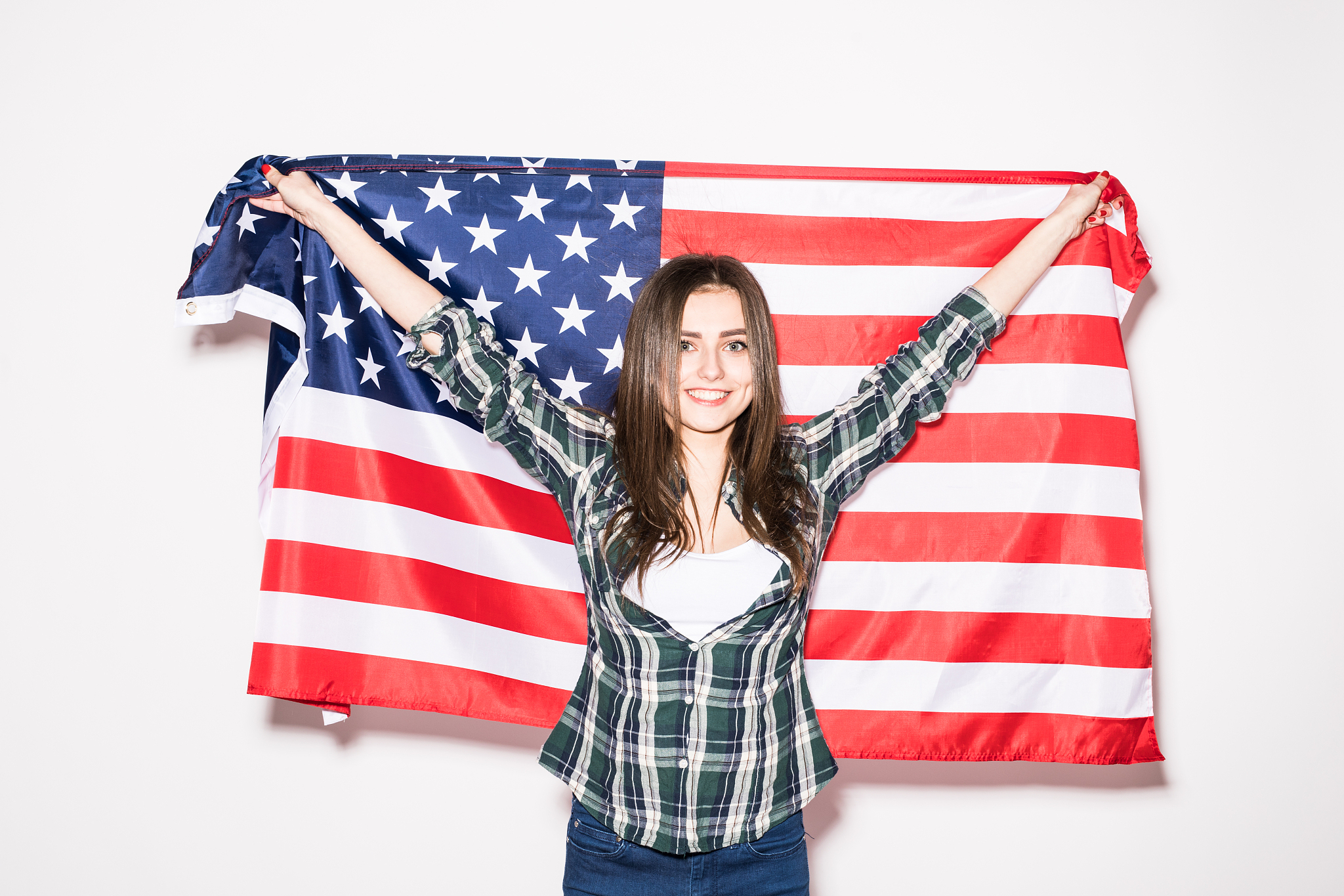 usa patriotism. young woman with us flag