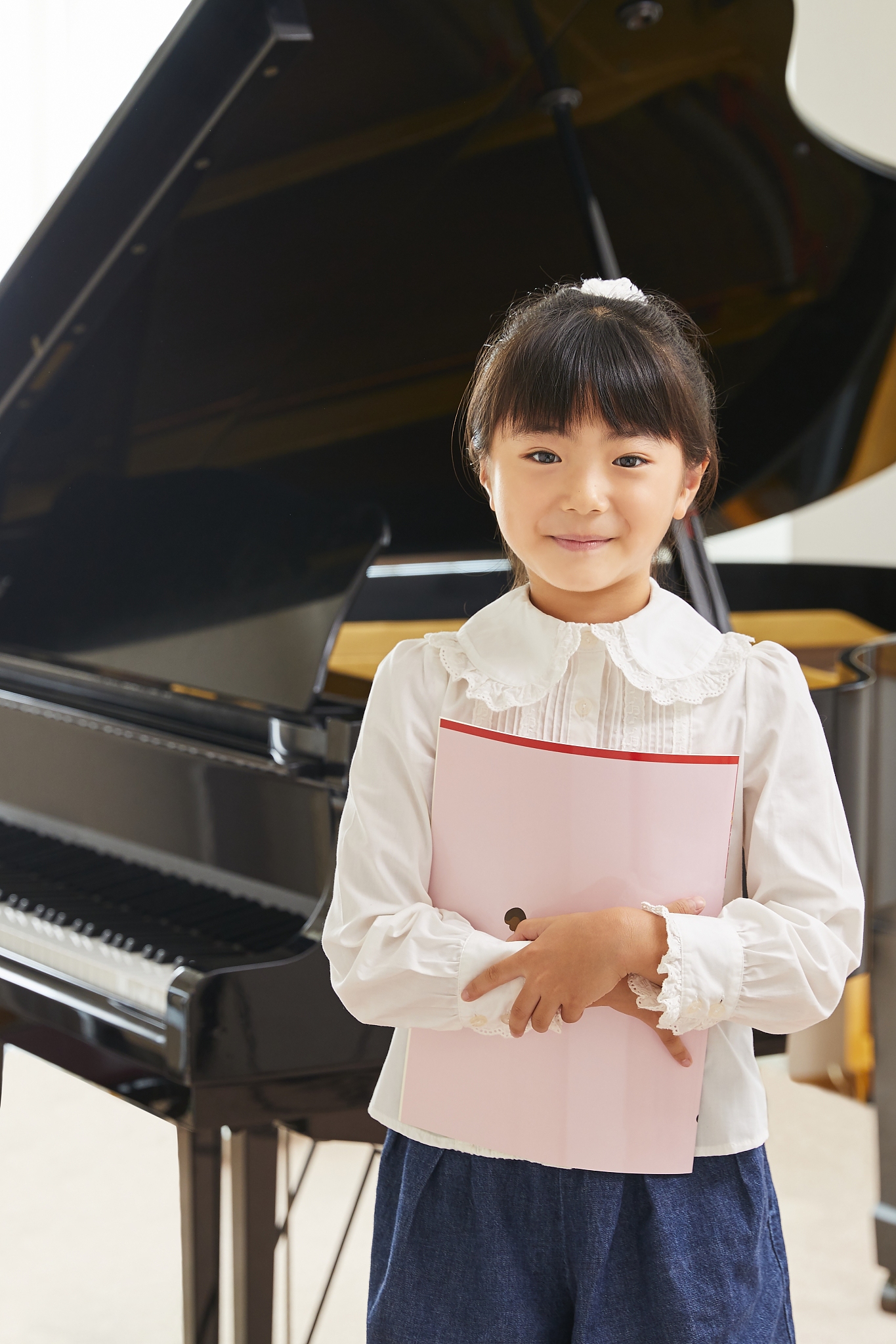 japanese kid practicing piano
