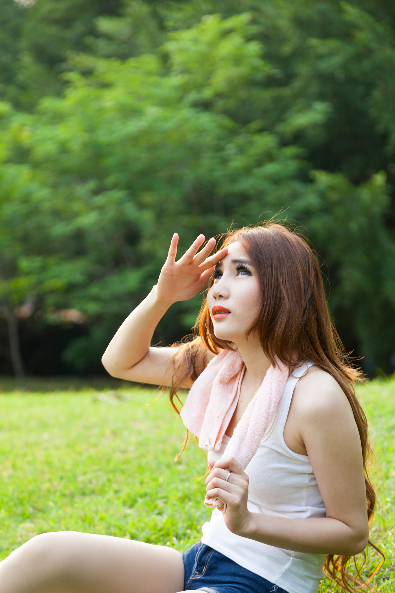 woman is sitting a break from exercise.