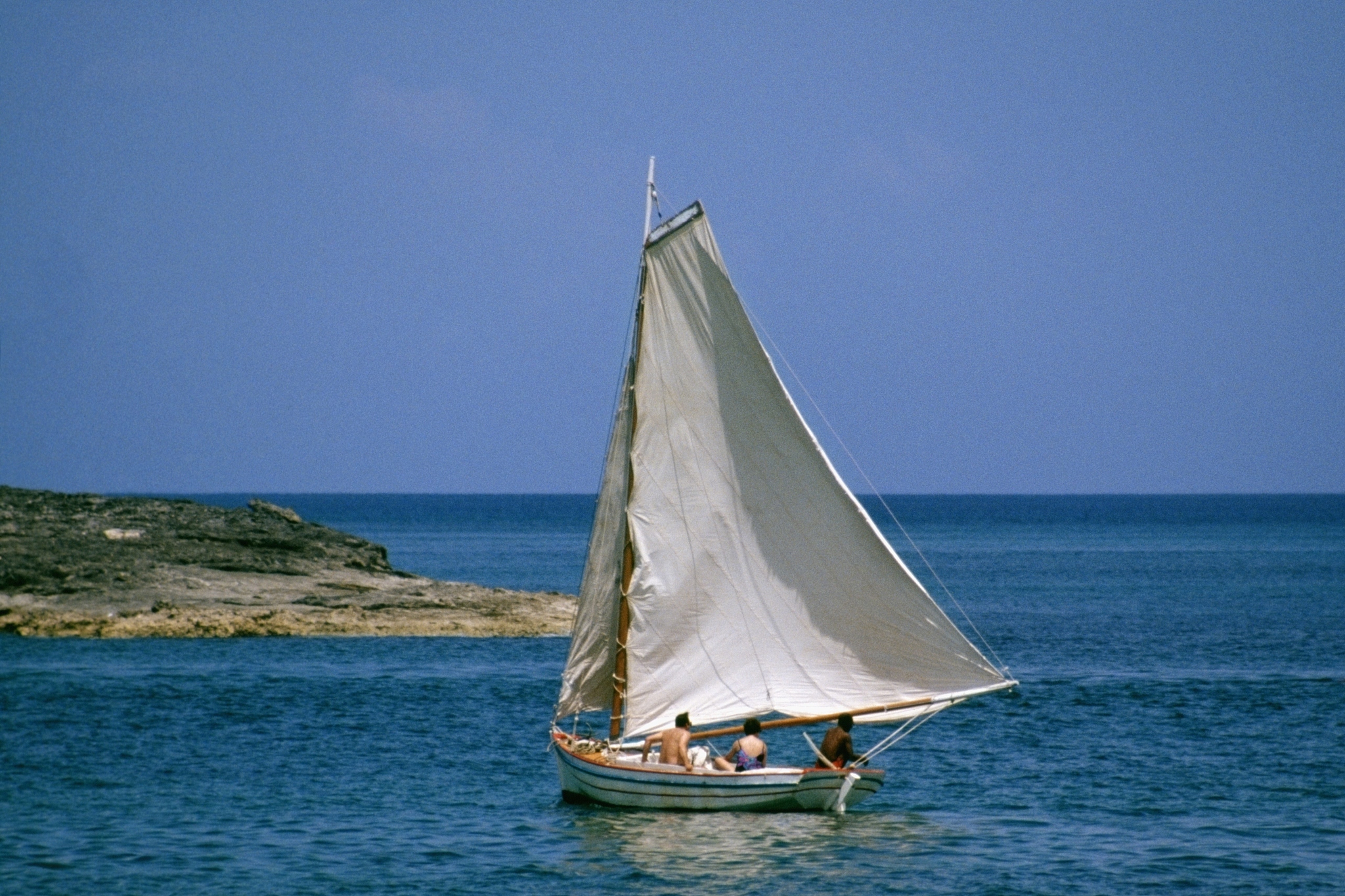 small group of people traveling in boats in a vast sea, nassau, 