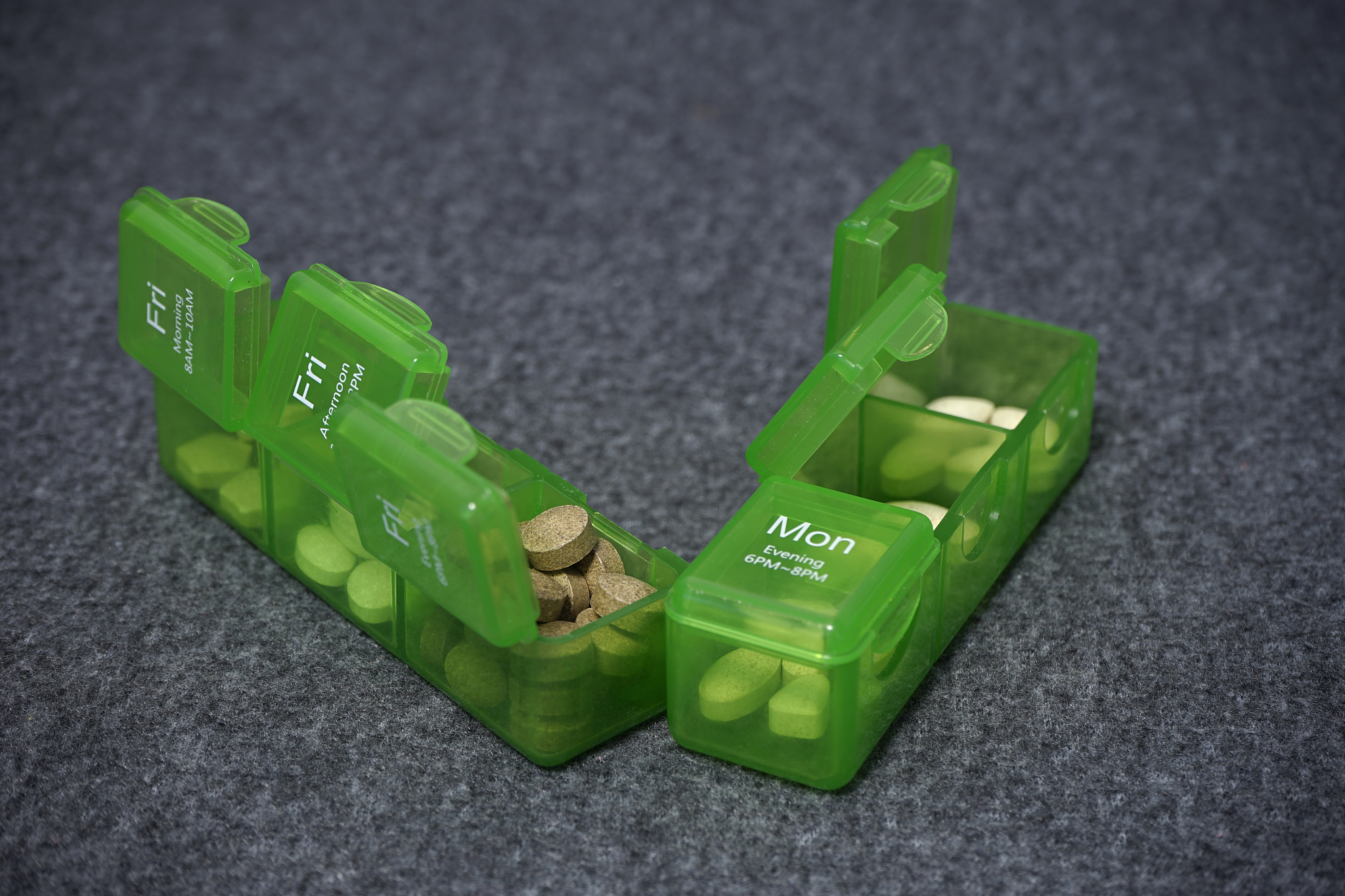daily pill box with medical pills