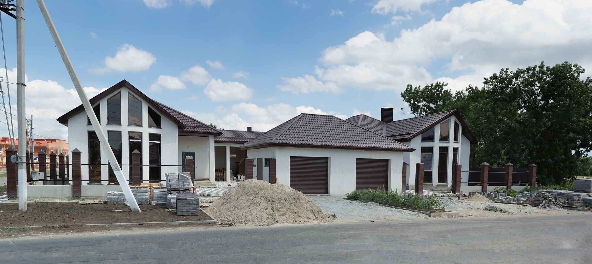 unfinished beautiful cottage for two families with garages for c