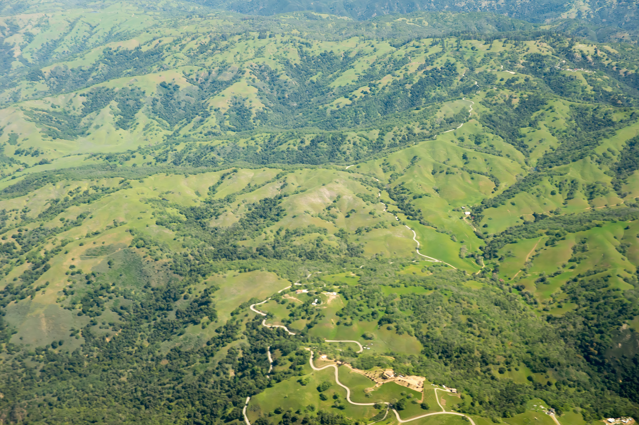 flying over sierra national forest hills and valleys