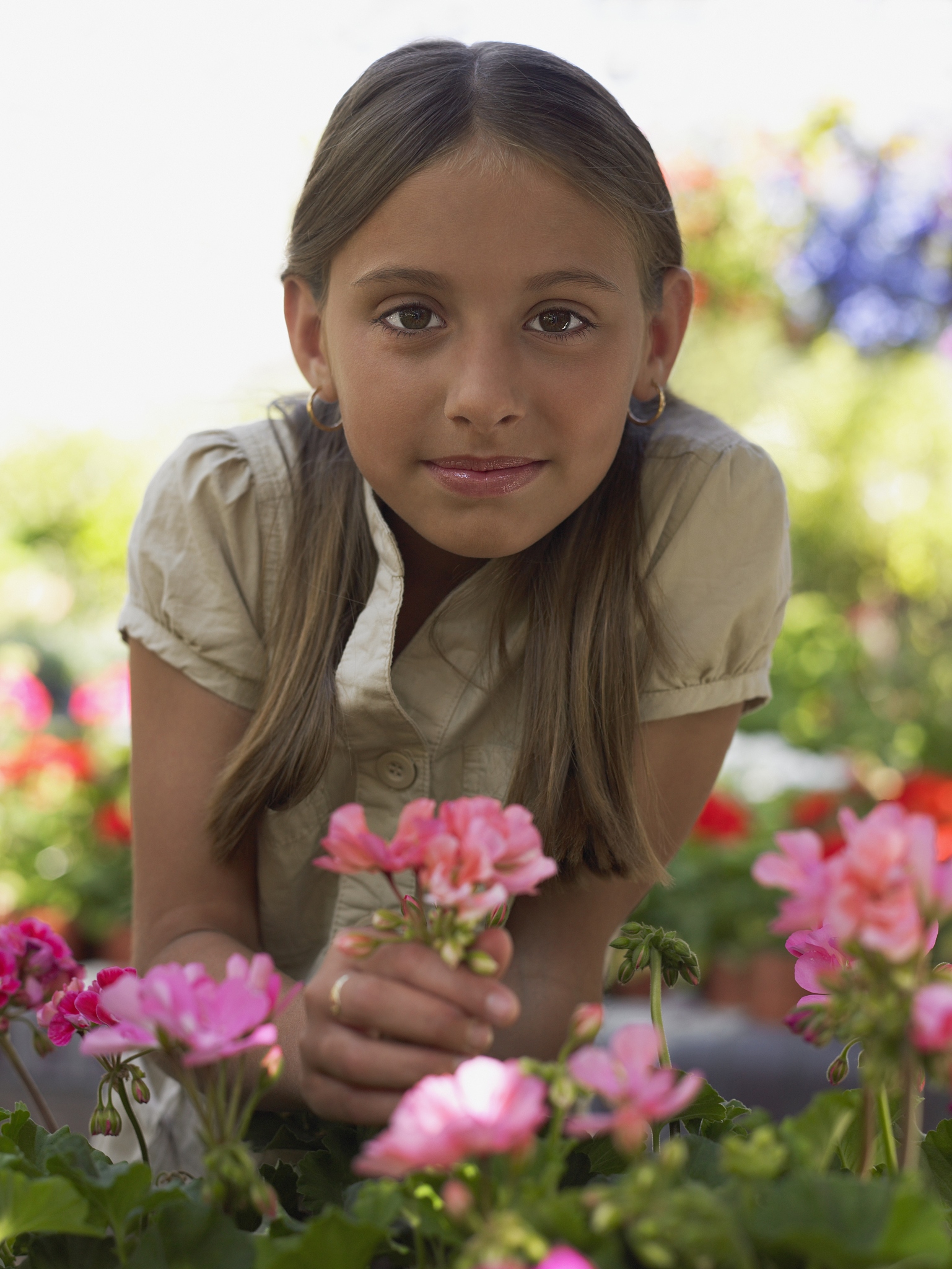 girl holding a plant