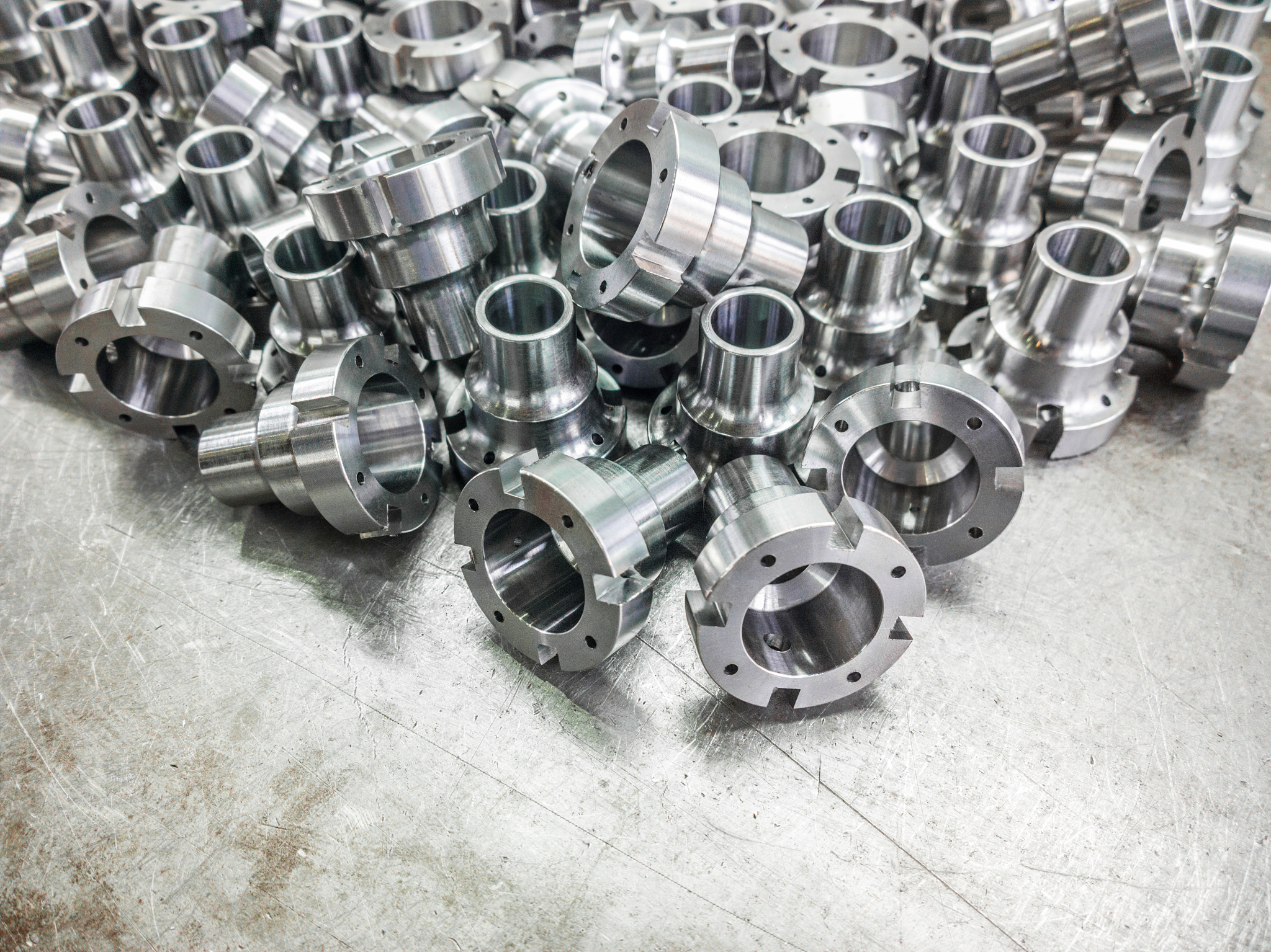 shiny steel parts after cnc turning, drilling and machining on s