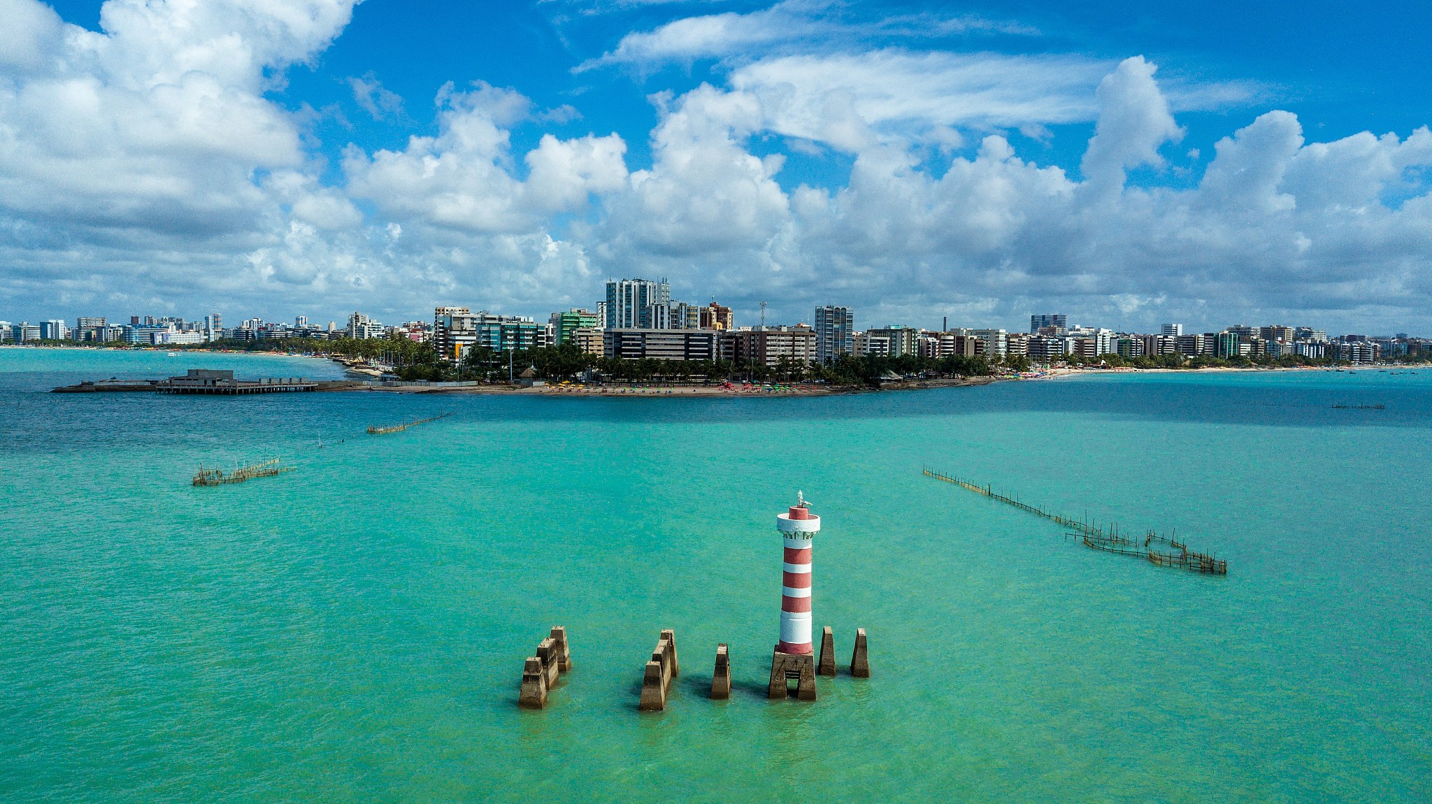 panoramic view of sea and buildings against sky
