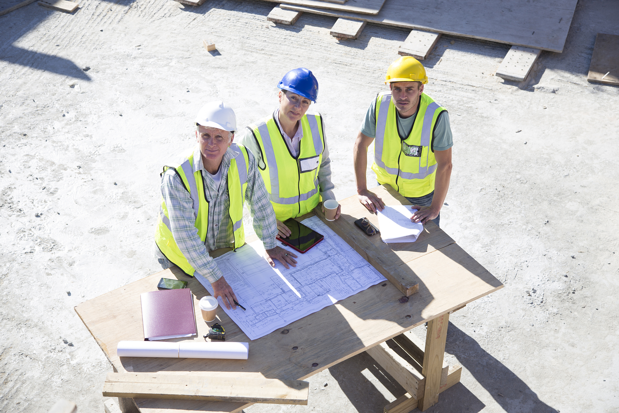 builder and architect  on building site