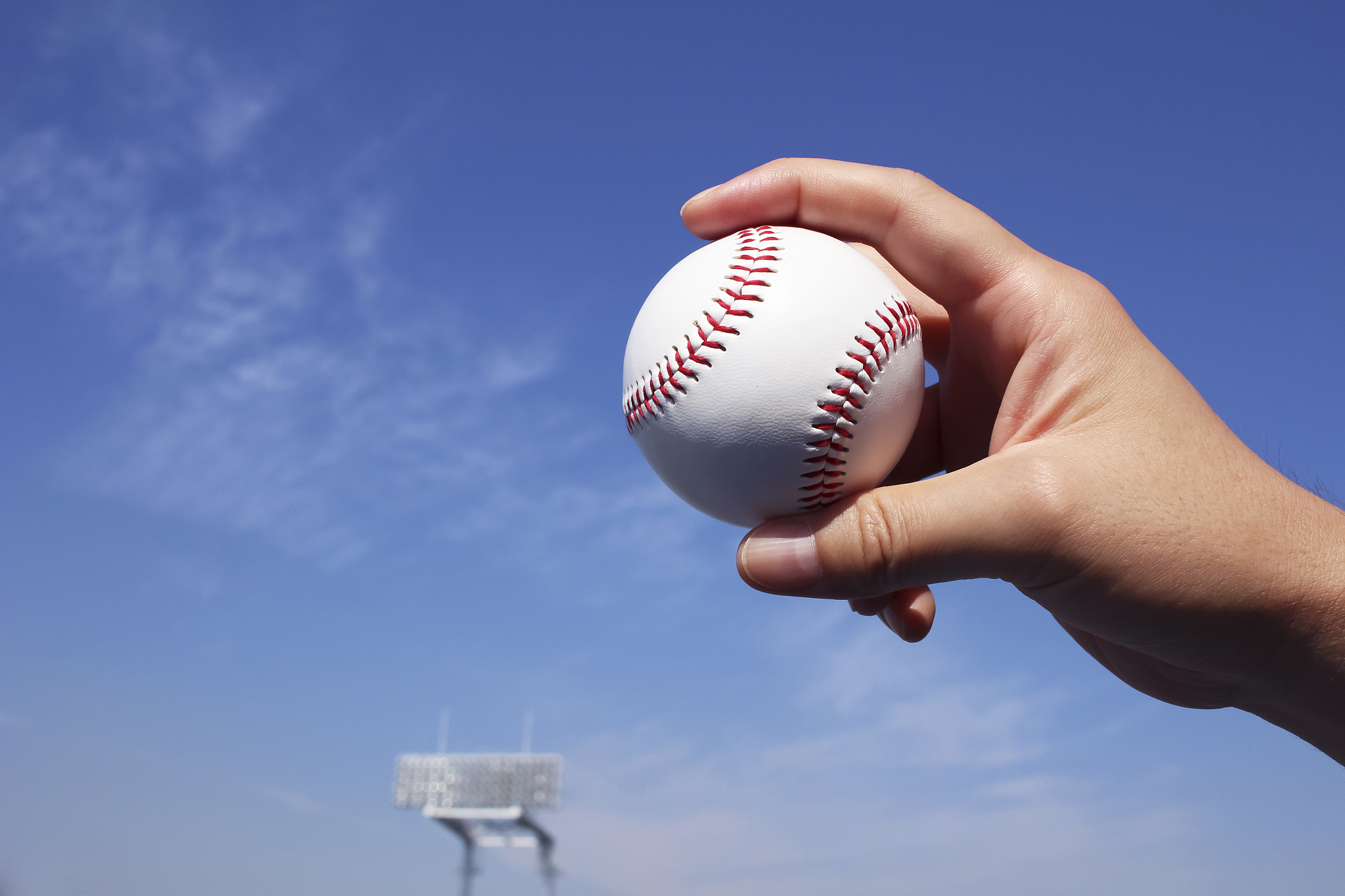 baseball field and a ball and a blue sky