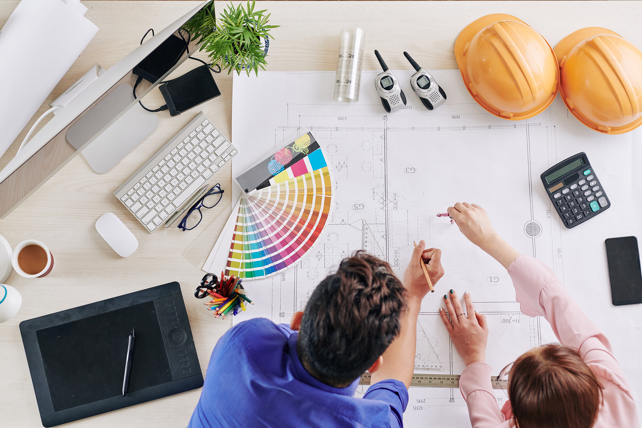 architects working on blueprint