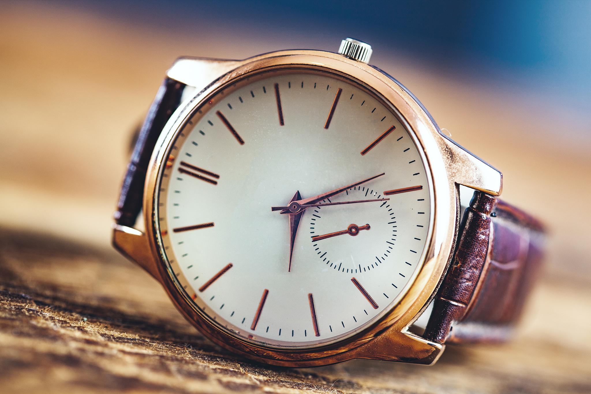 man elegant watch on wooden table background
