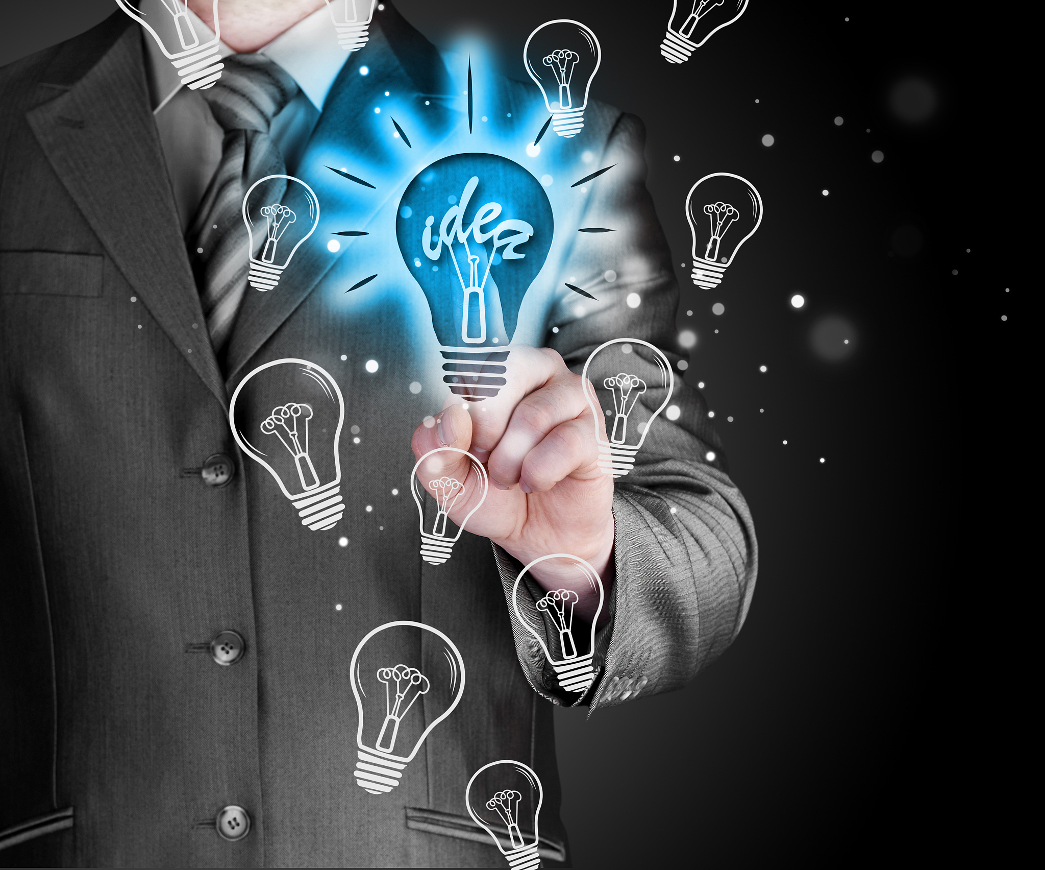 business man touching light of idea