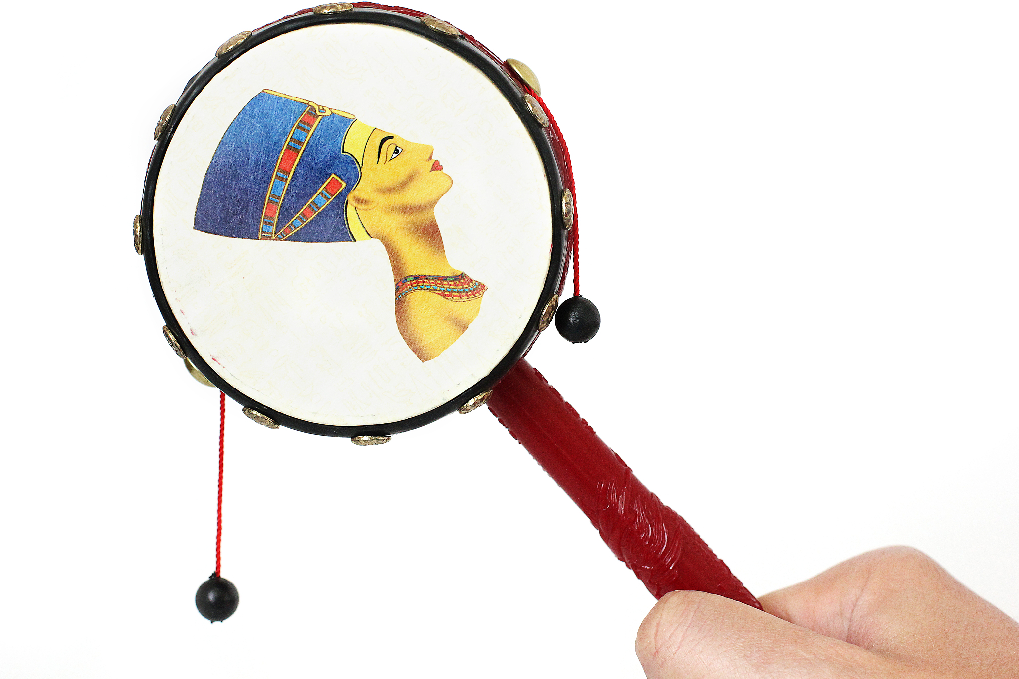 the drum is in hand. hand drum with bells on a white background
