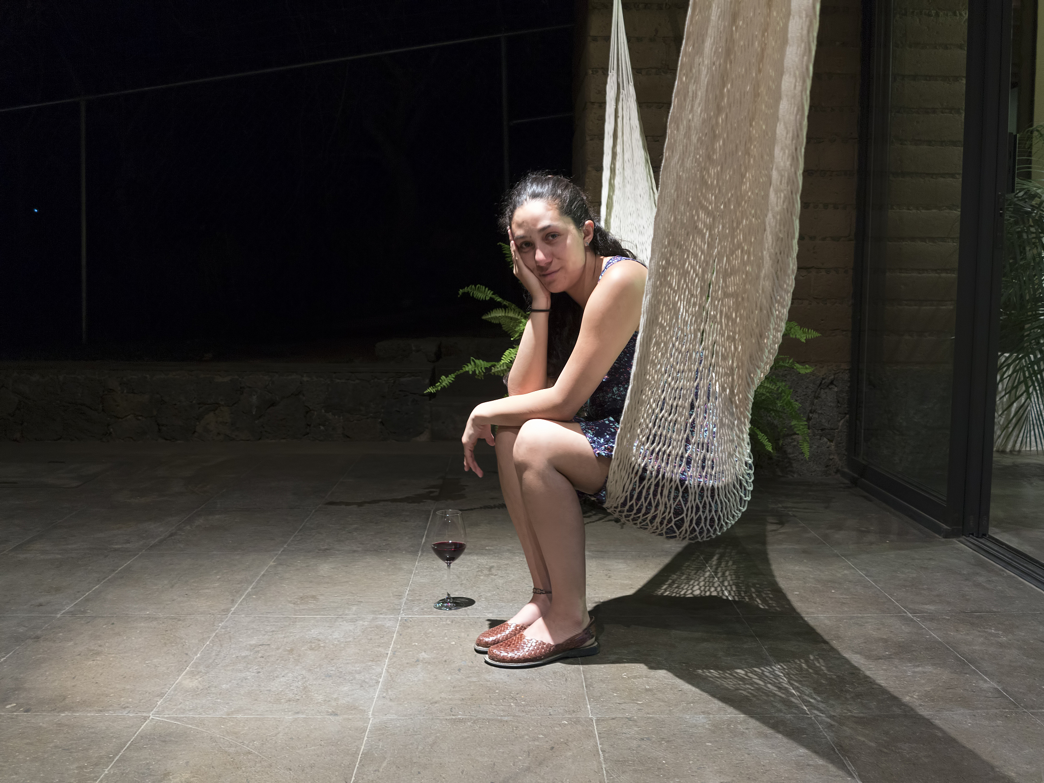 woman relaxing in hammock