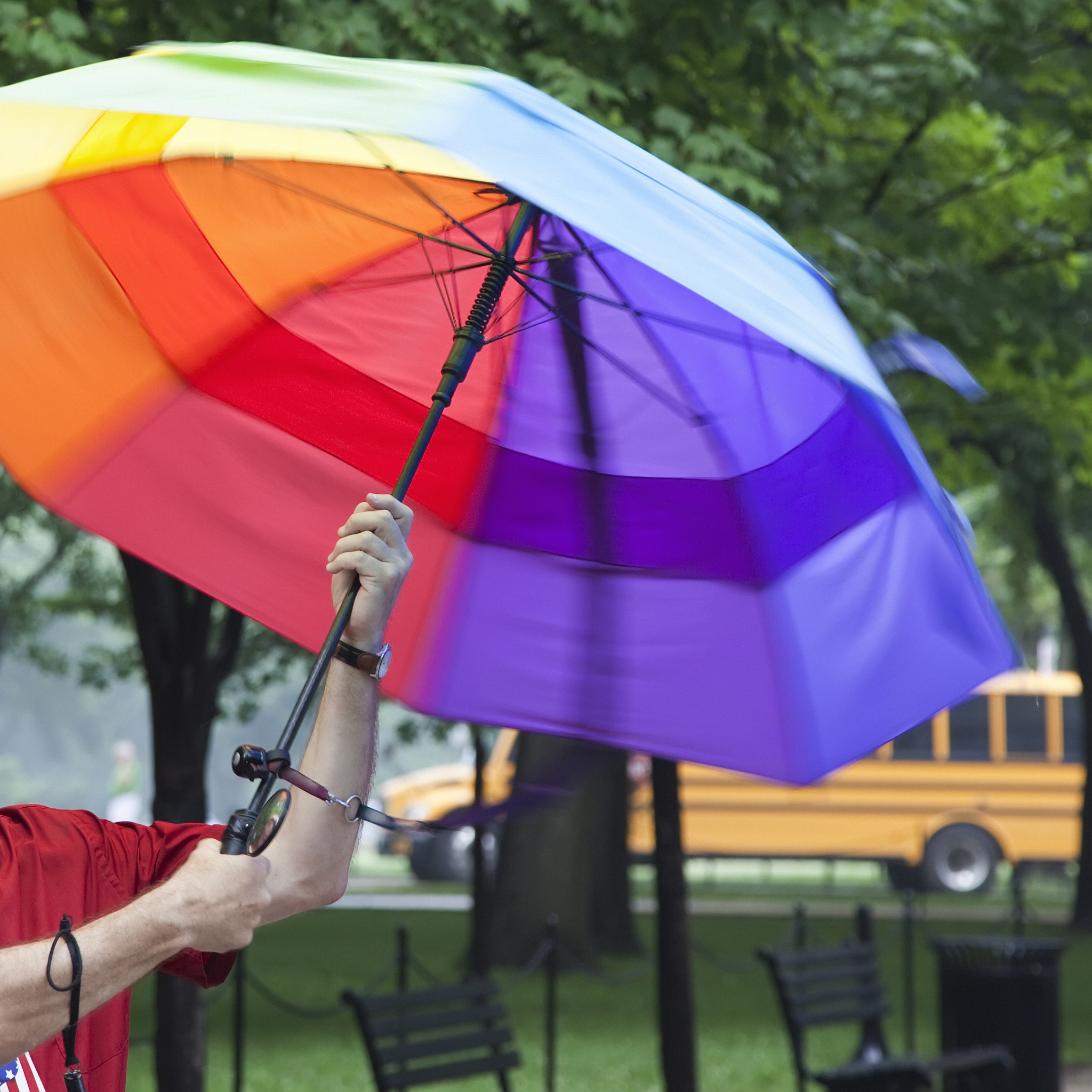spinning rainbow-colored umbrella