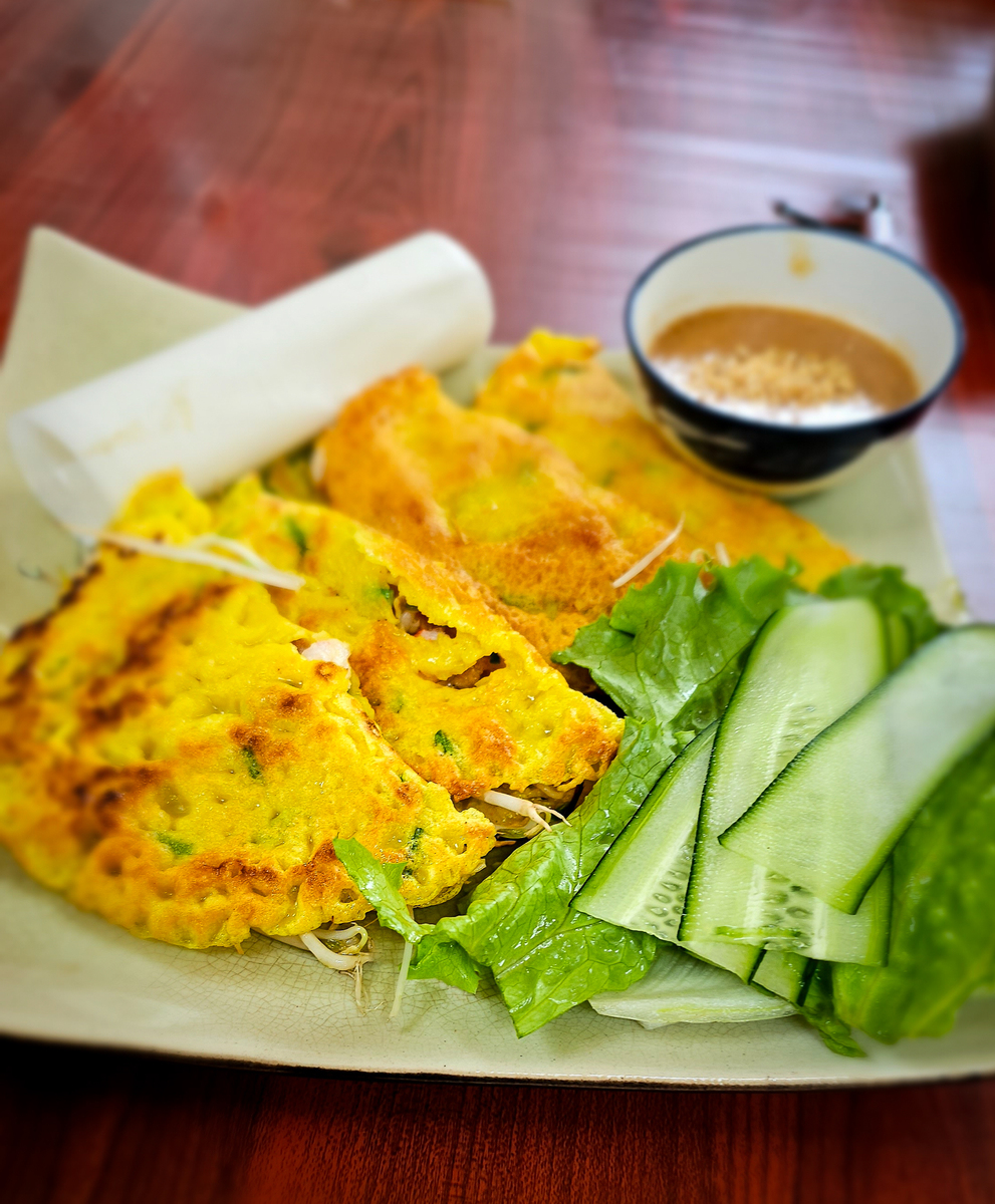 请描写吃手抓饼的味道和感受