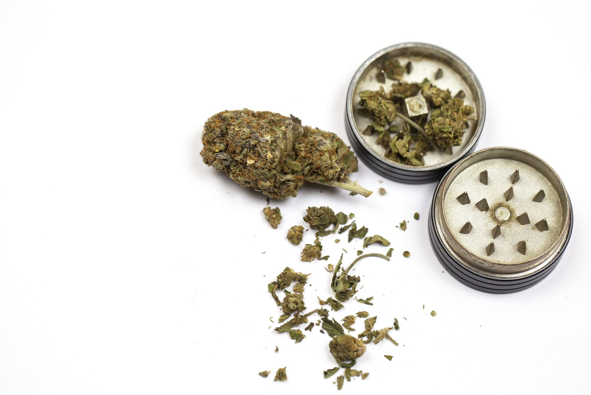 marijuana with mill on a white background