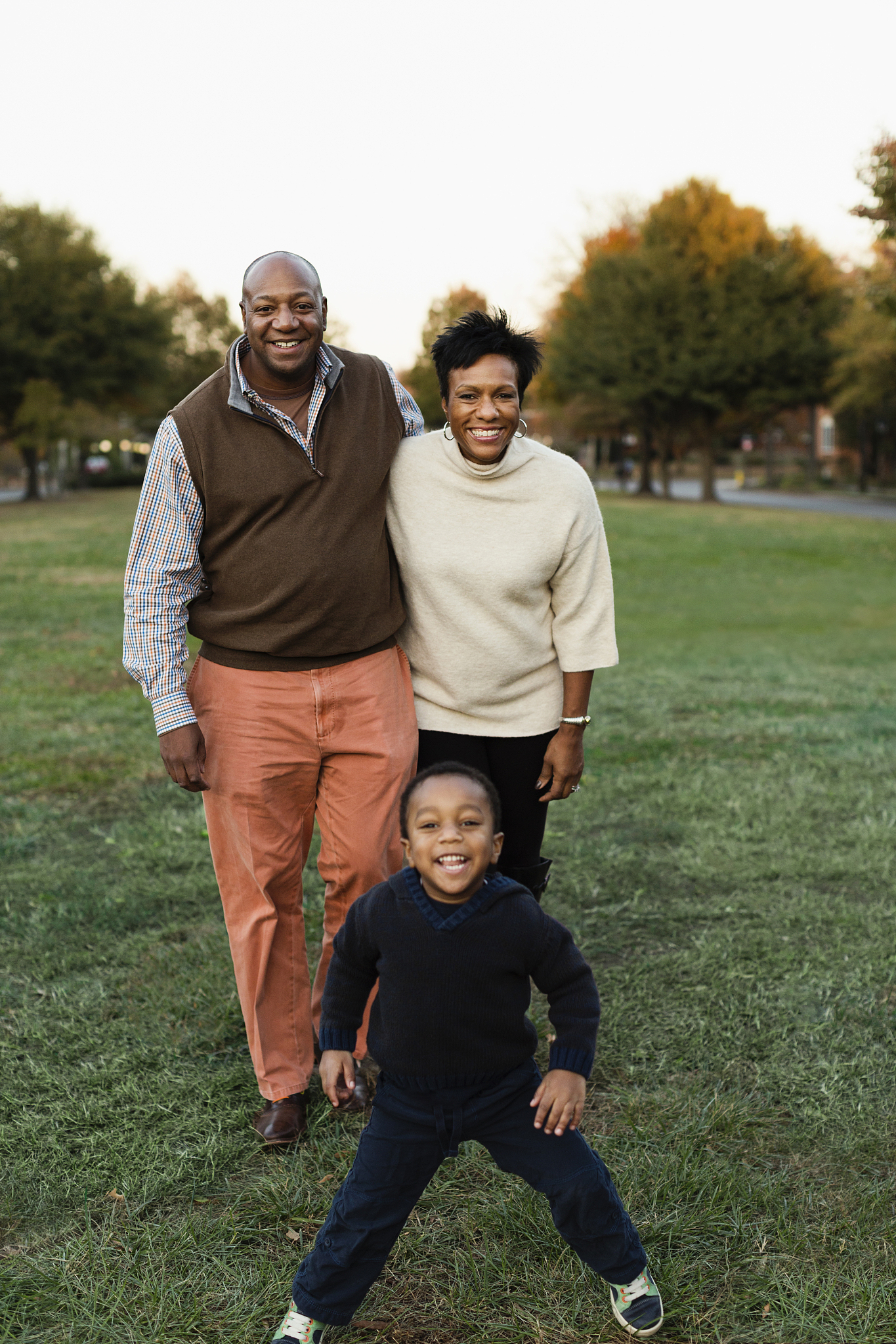 african american family smiling in park