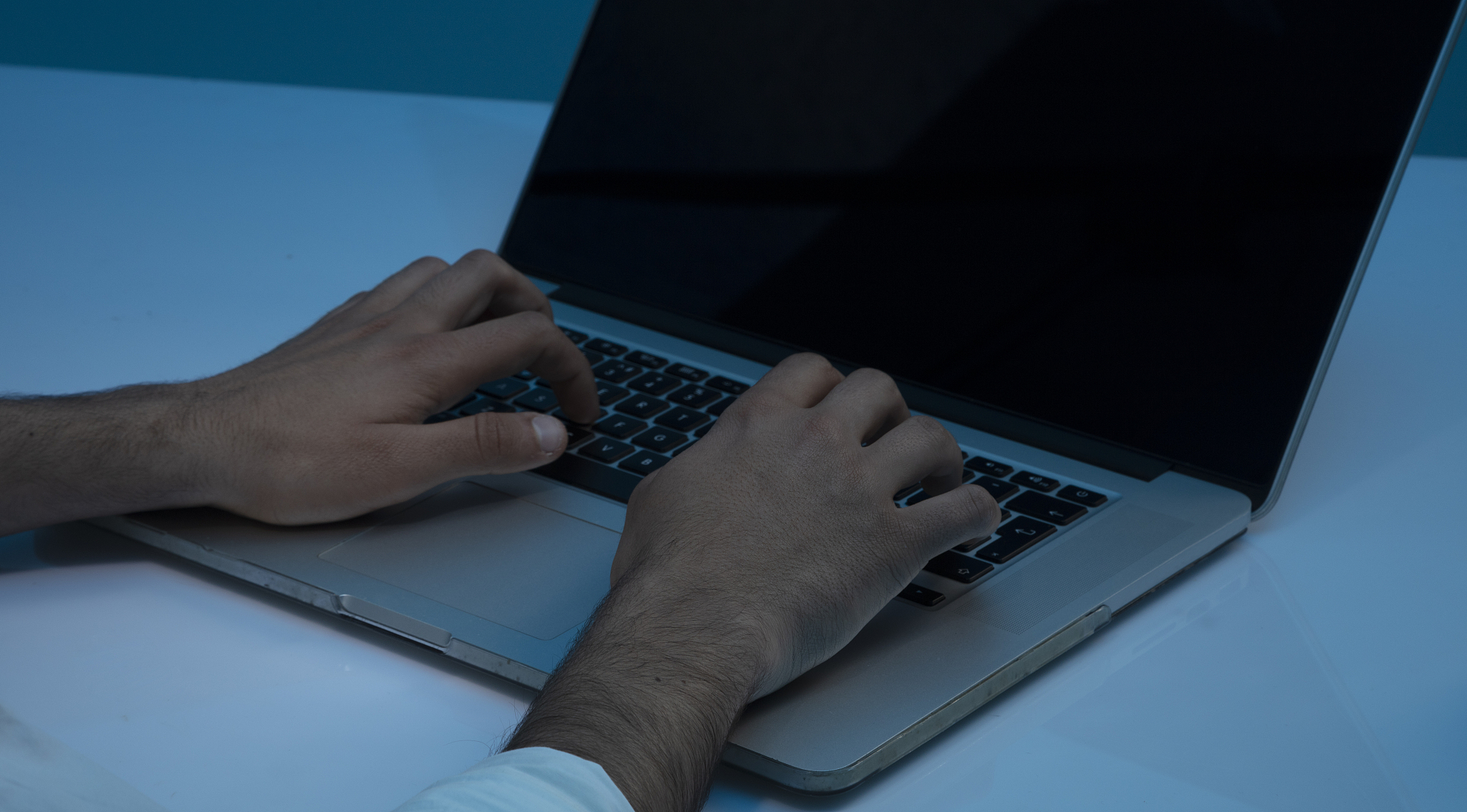 man searching something on computer