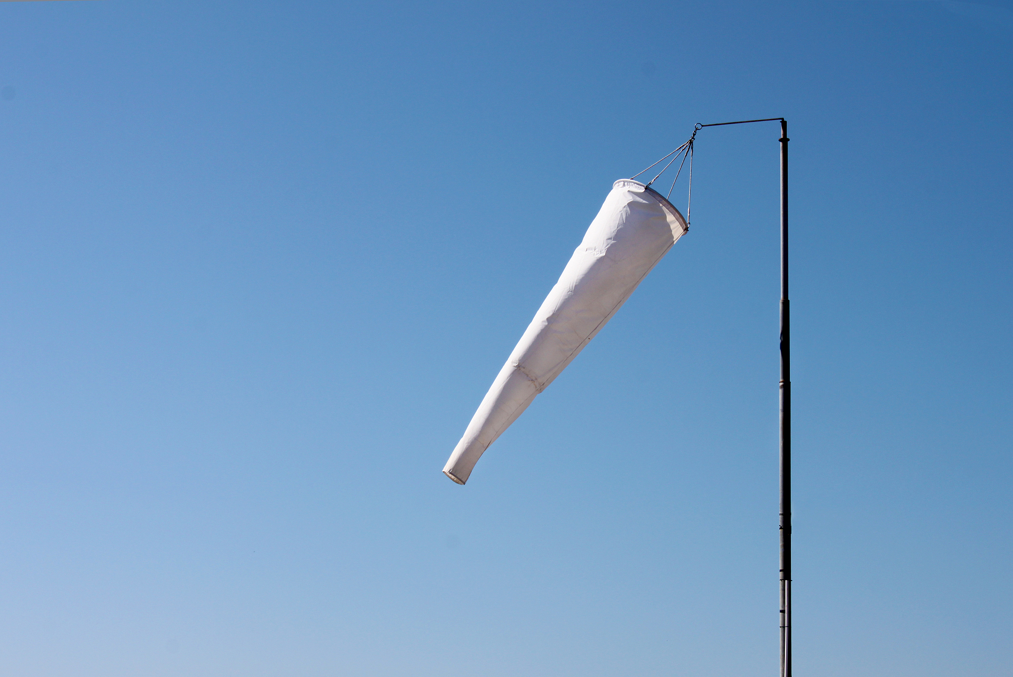 windsock against a blue sky