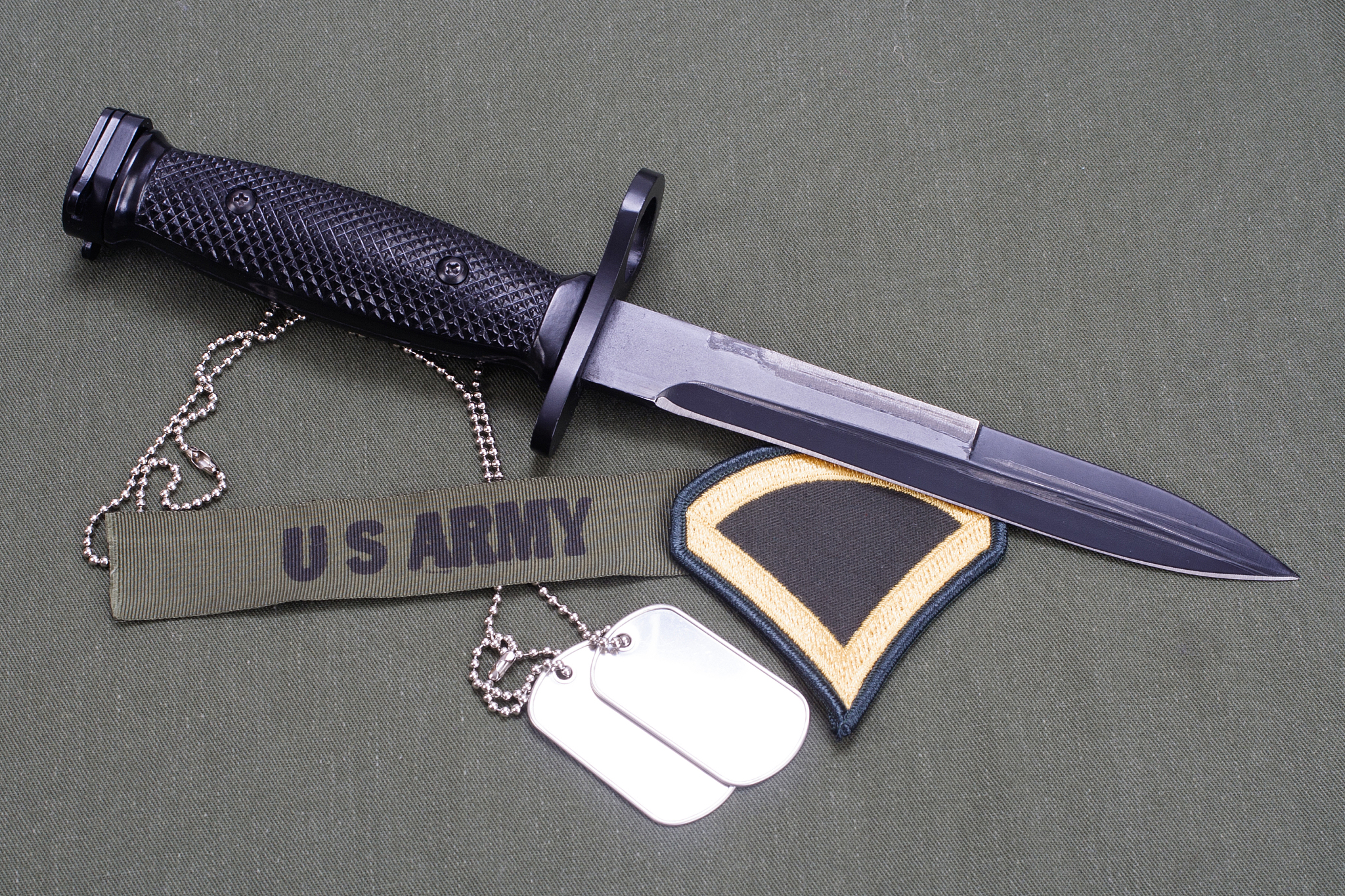 bayonet and dog tags on us army uniform