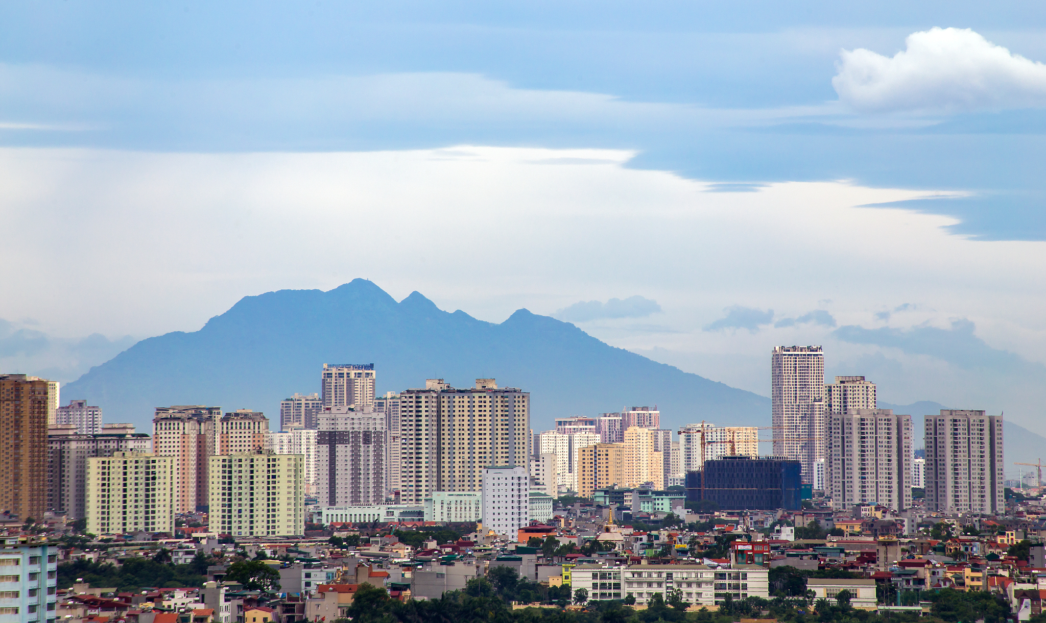 buildings in city against sky