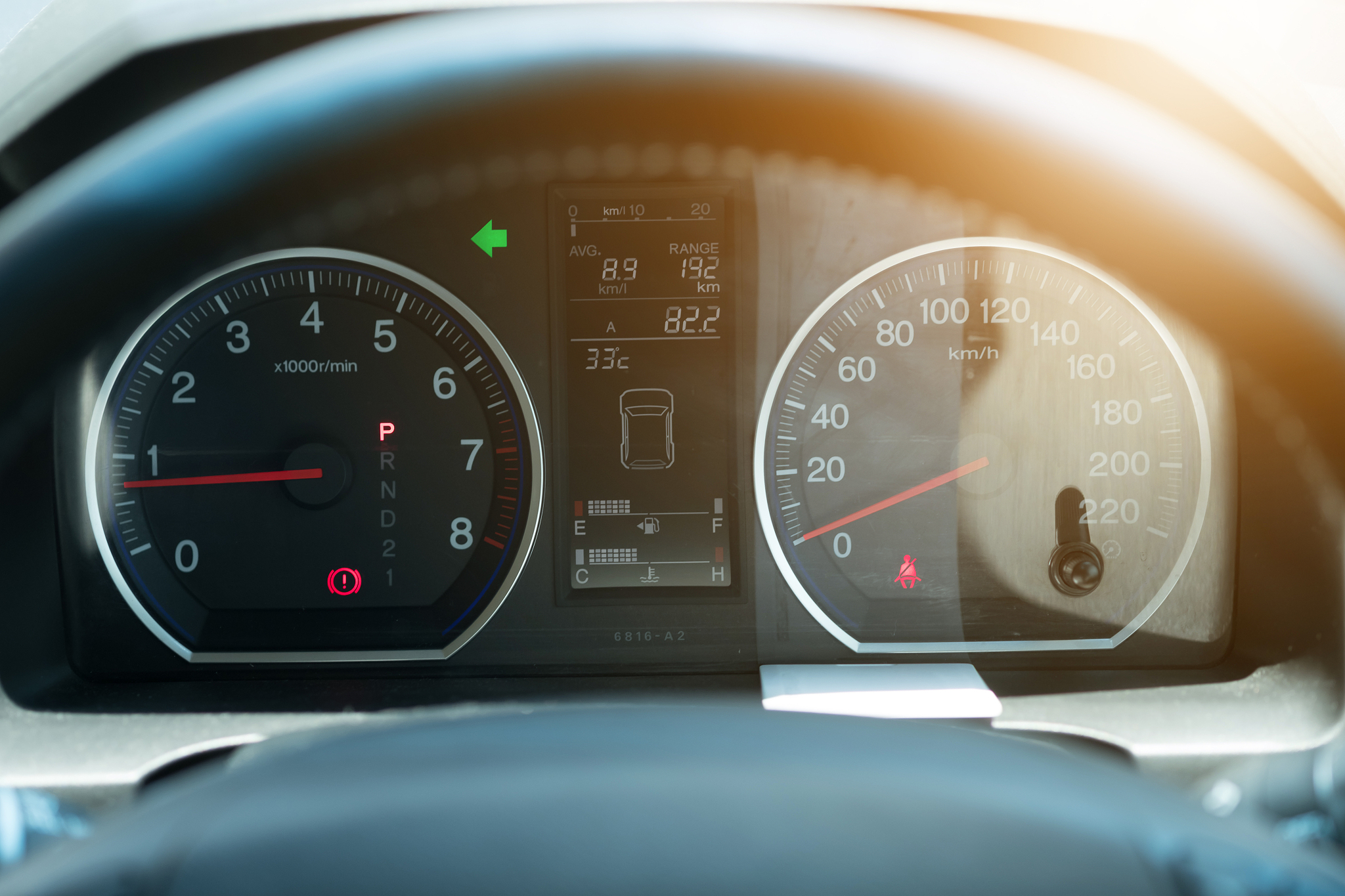 modern car illuminated dashboard closeup.