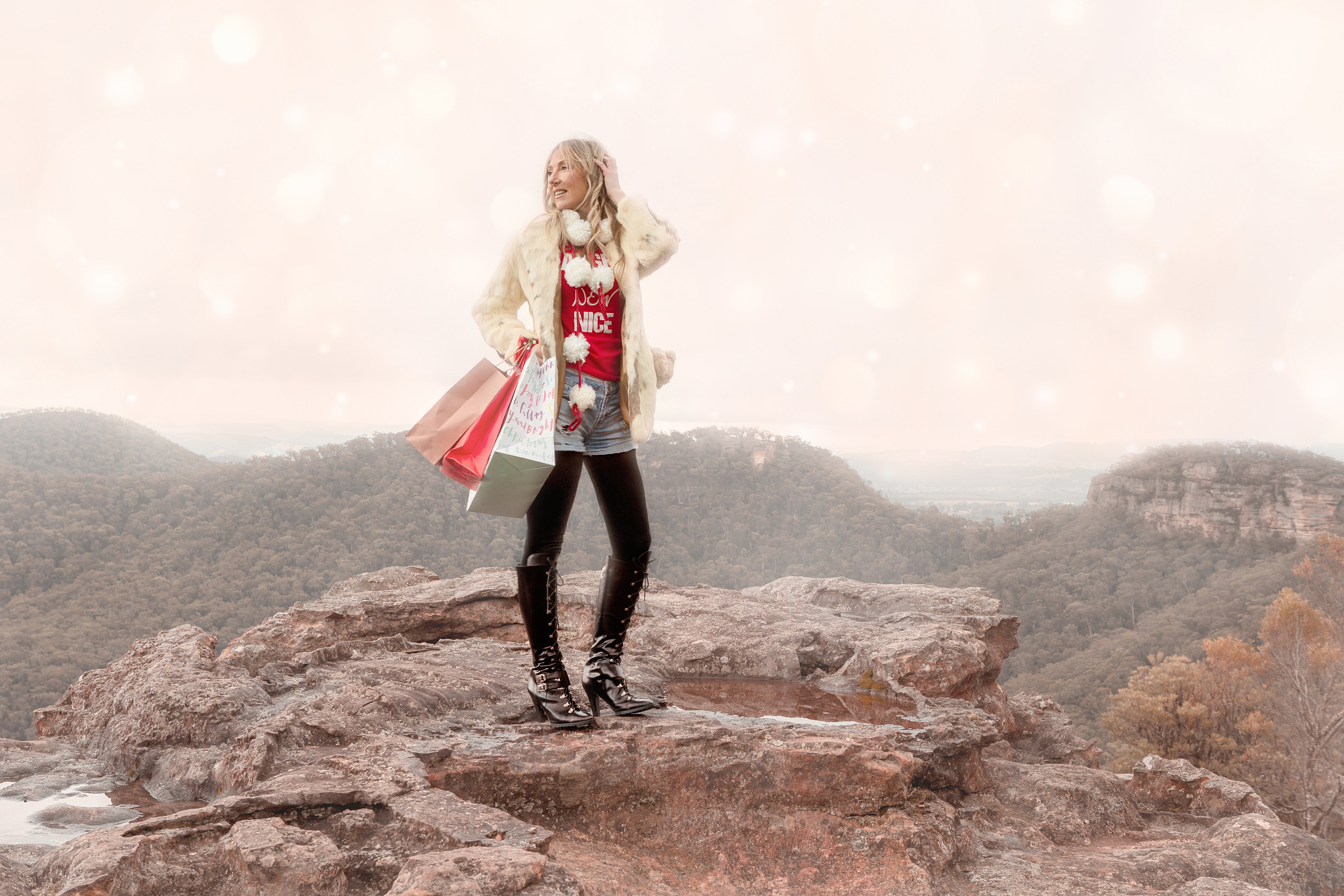 woman holding christmas bags. christmas in blue mountains, aussi