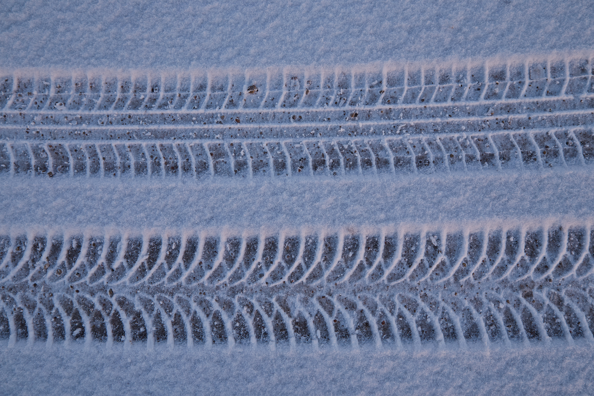 two different types of car tires traces
