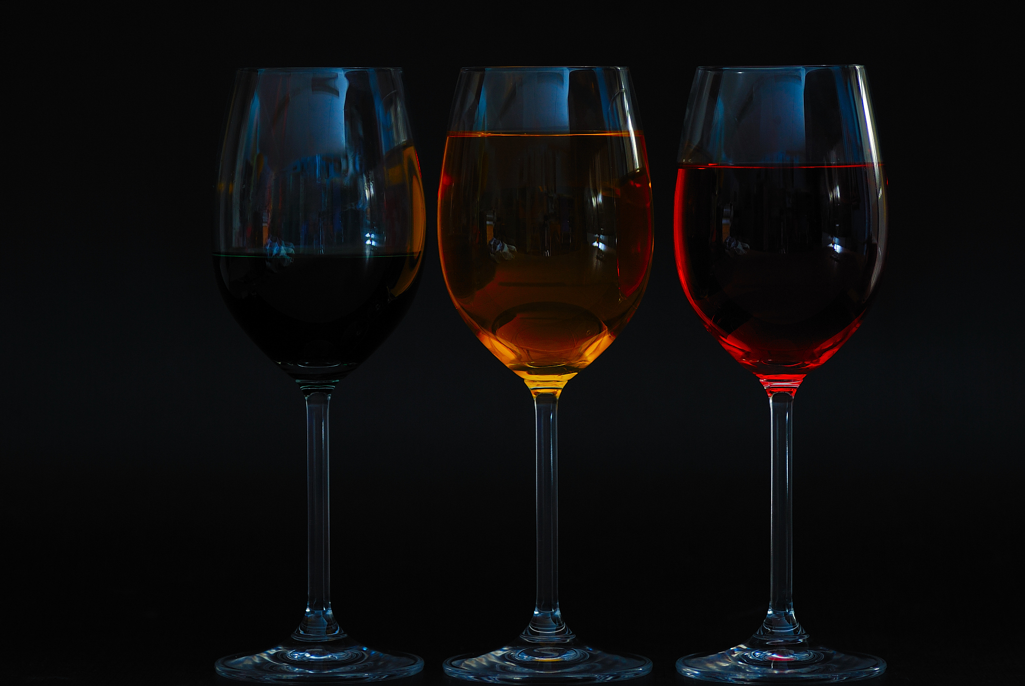 three glasses with different completely