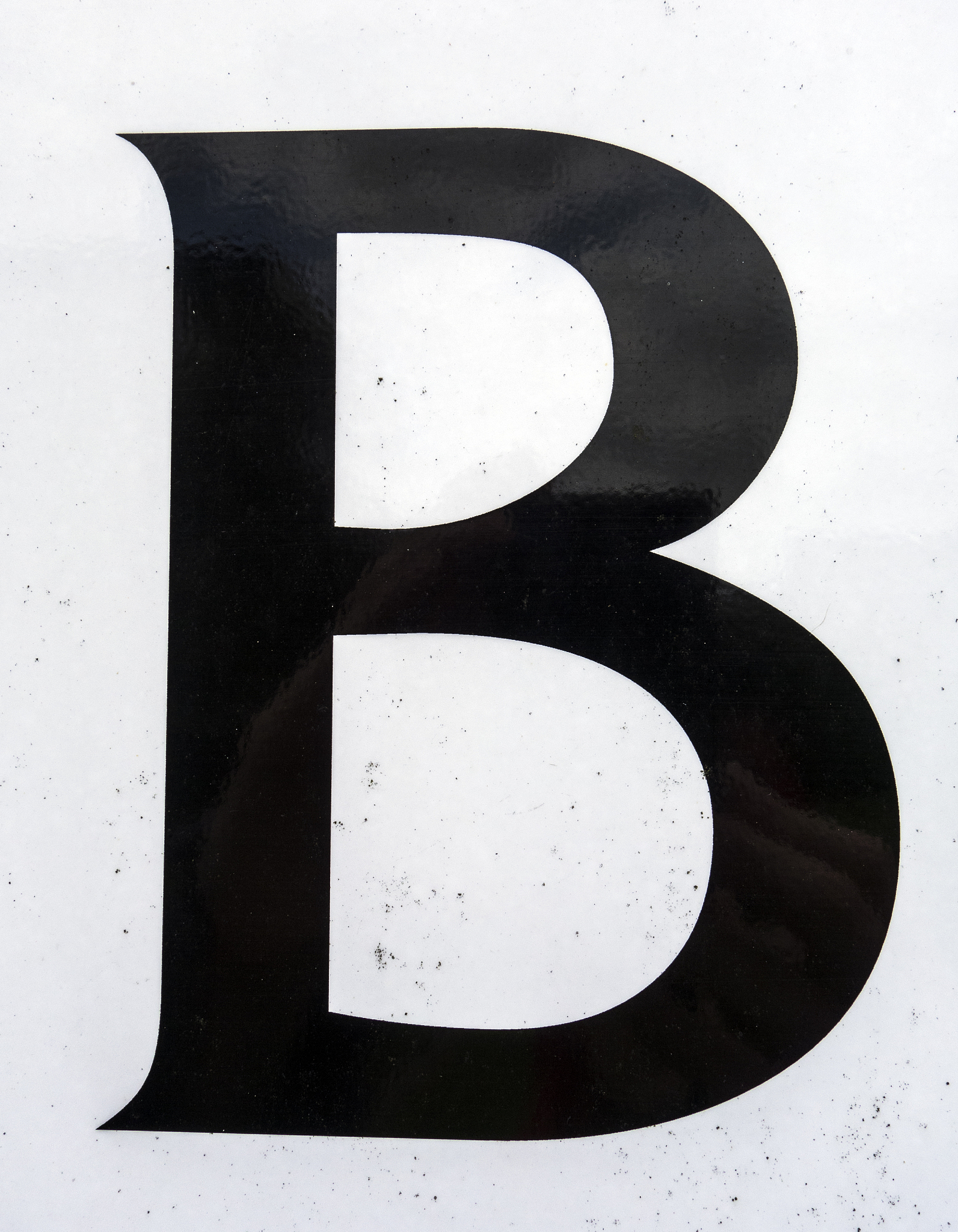 written wording in distressed state typography found letter b