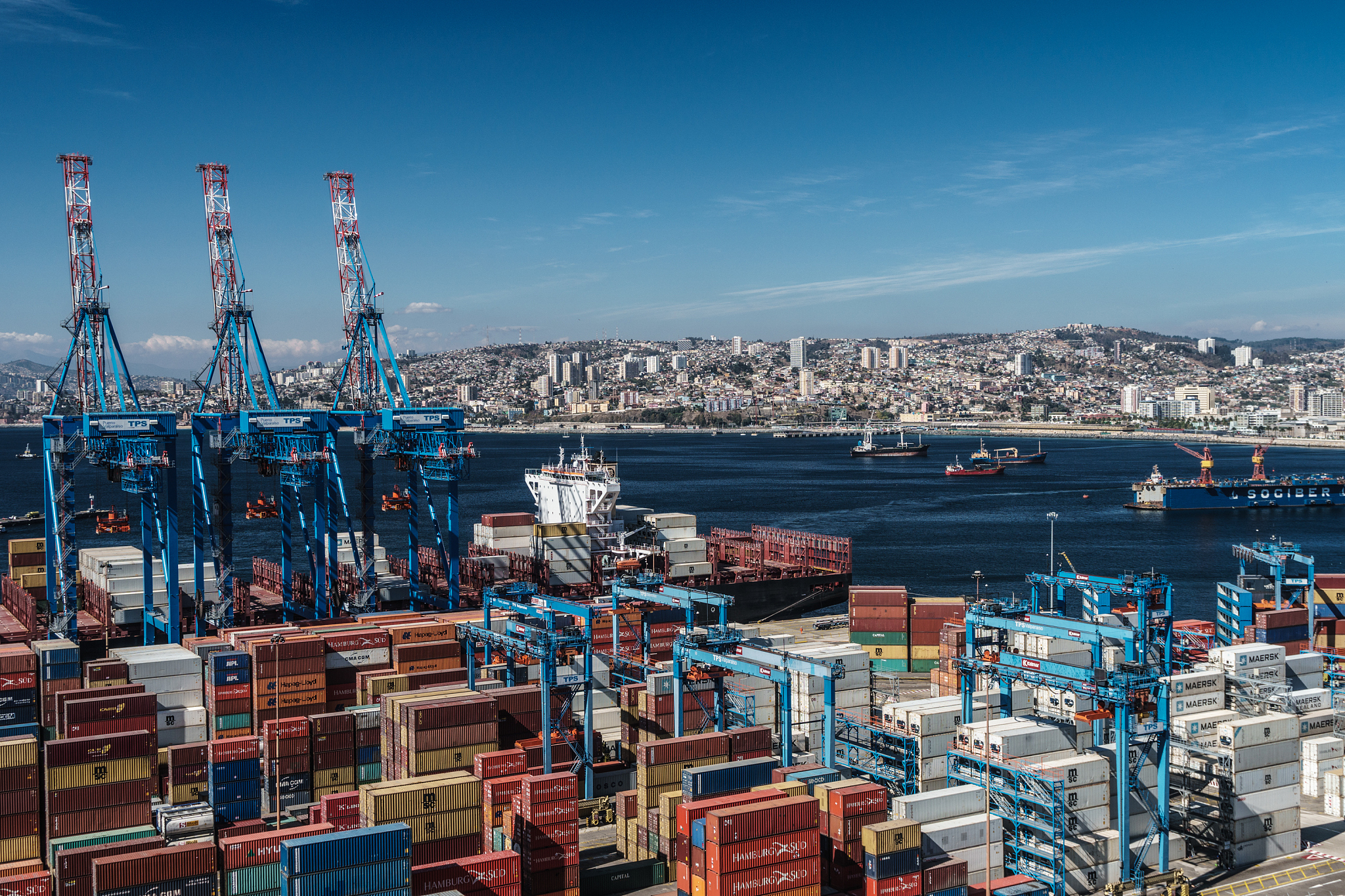 aerial view of the bay of valparaiso with port and cranes in for