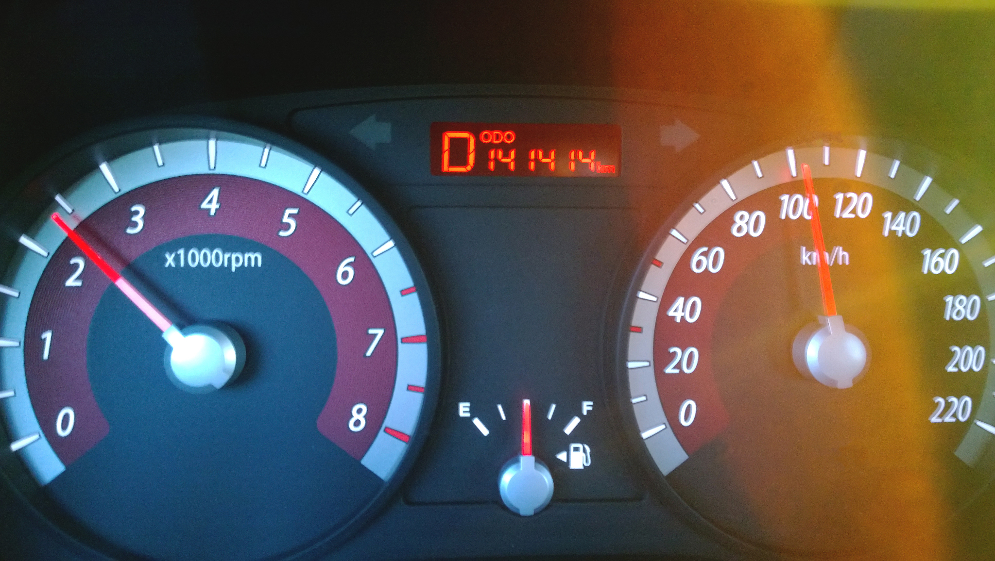 car dashboard while driving at high speed - a nice number on the
