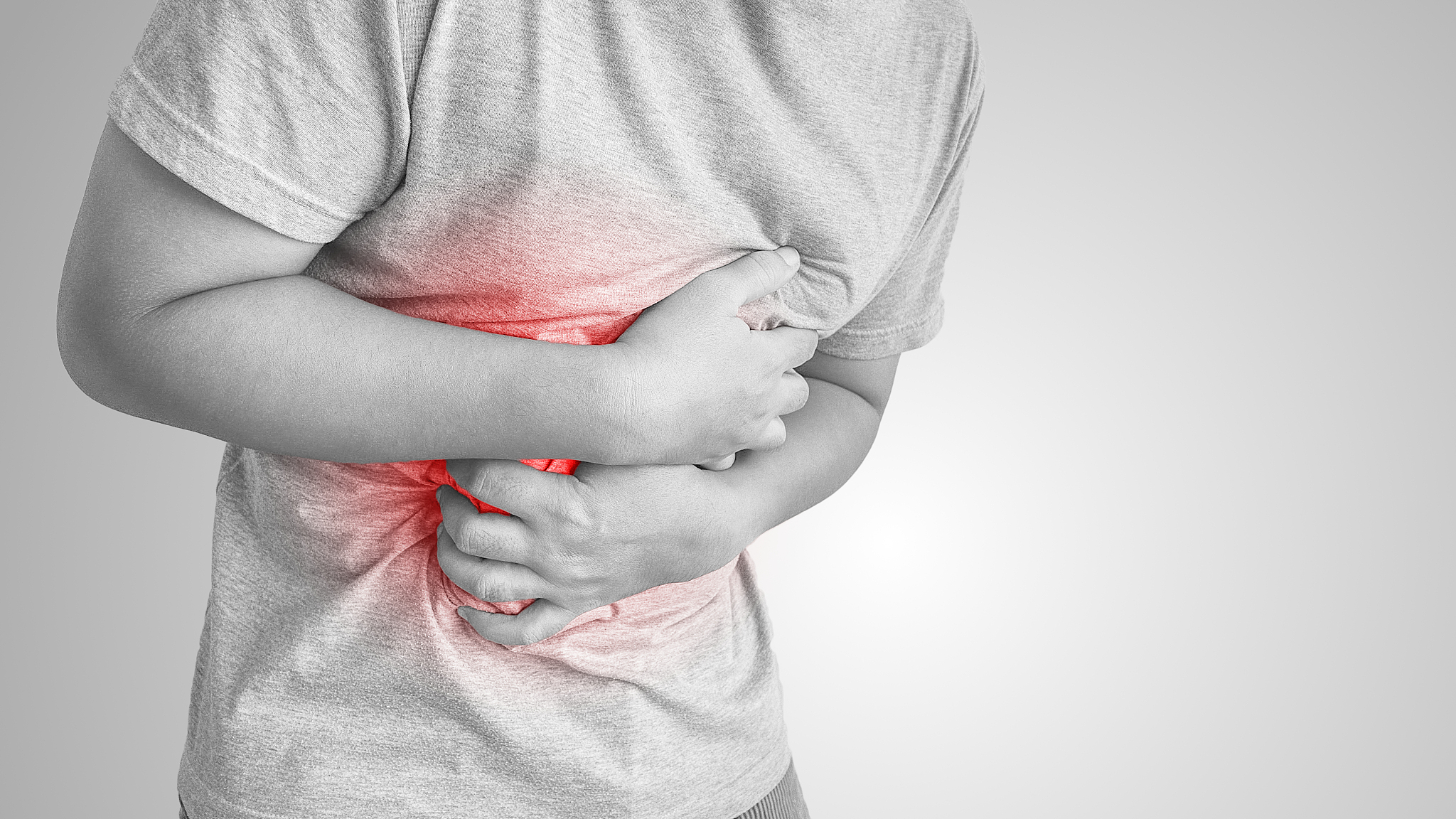 asian man suffering from stomachache.