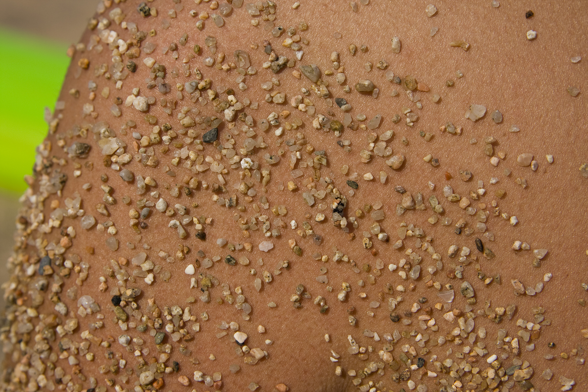 little rocks on a beautiful tanned skin