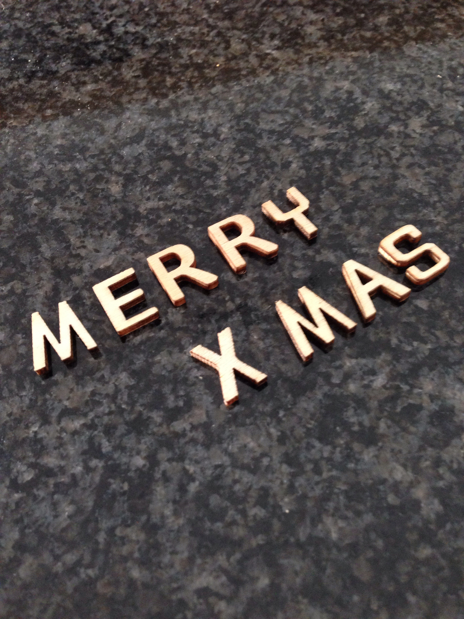 merry christmas quote wood on marble letters
