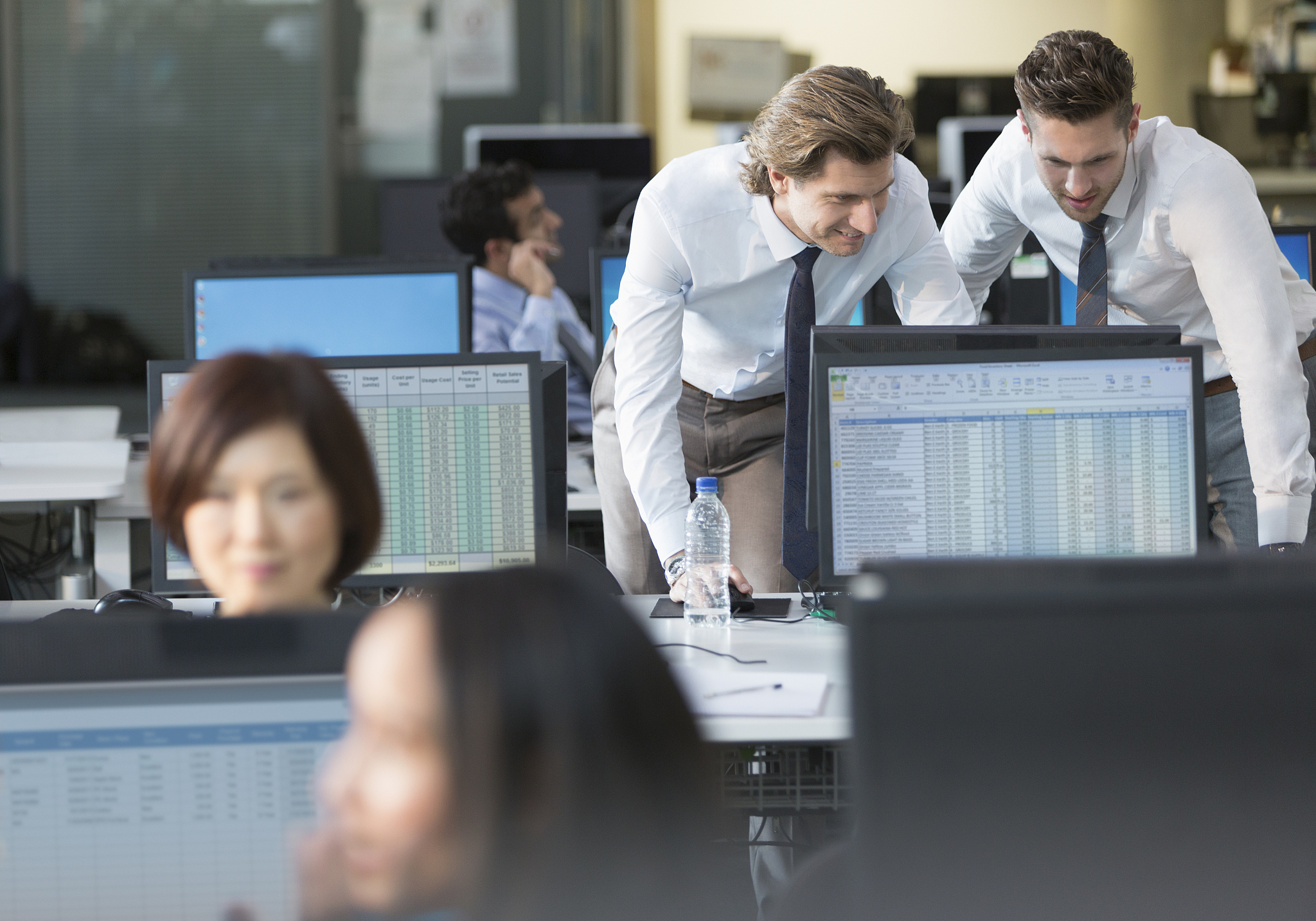 businessmen working at computer in office