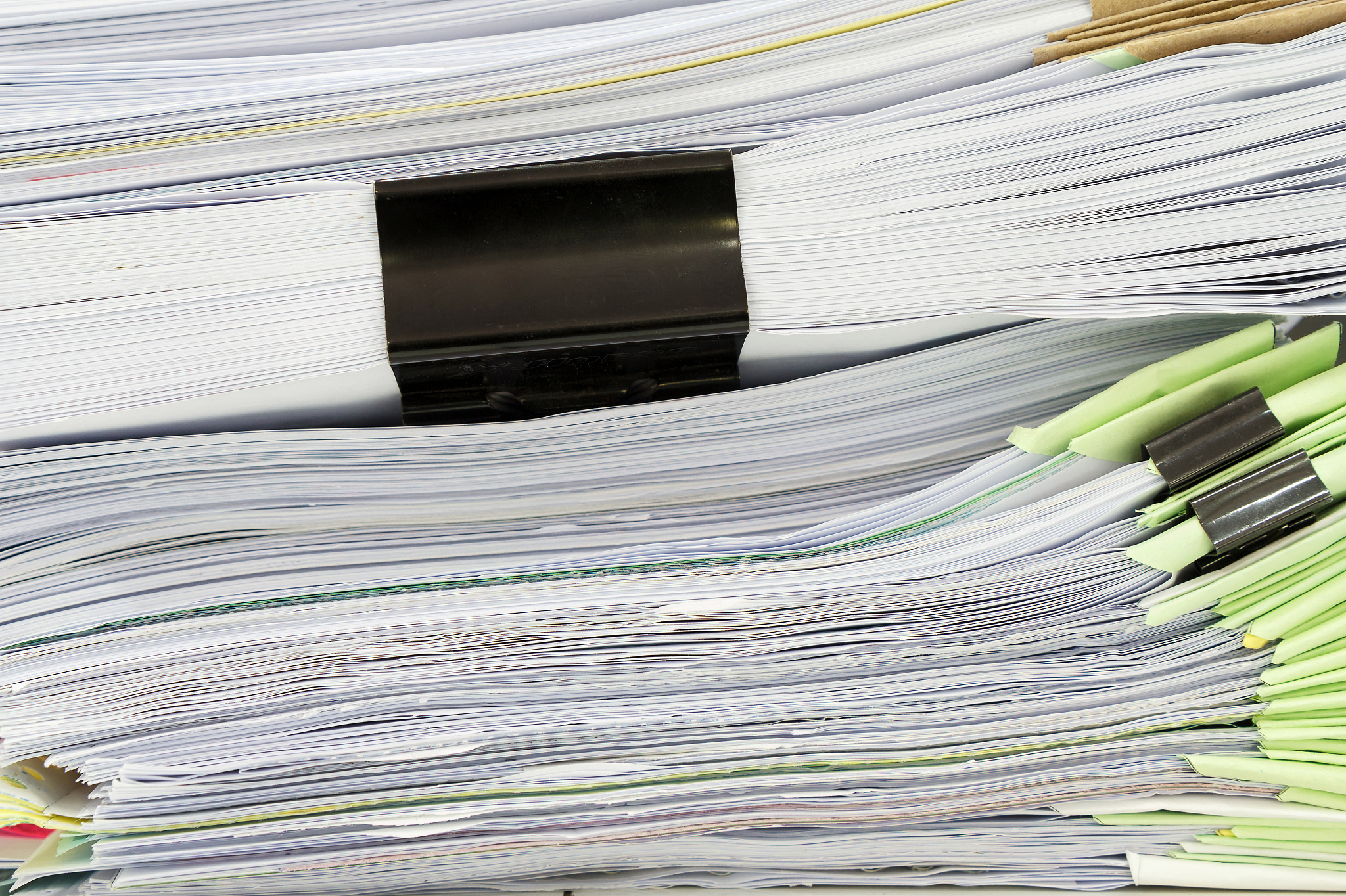 close up of business documents stack on desk , report papers sta