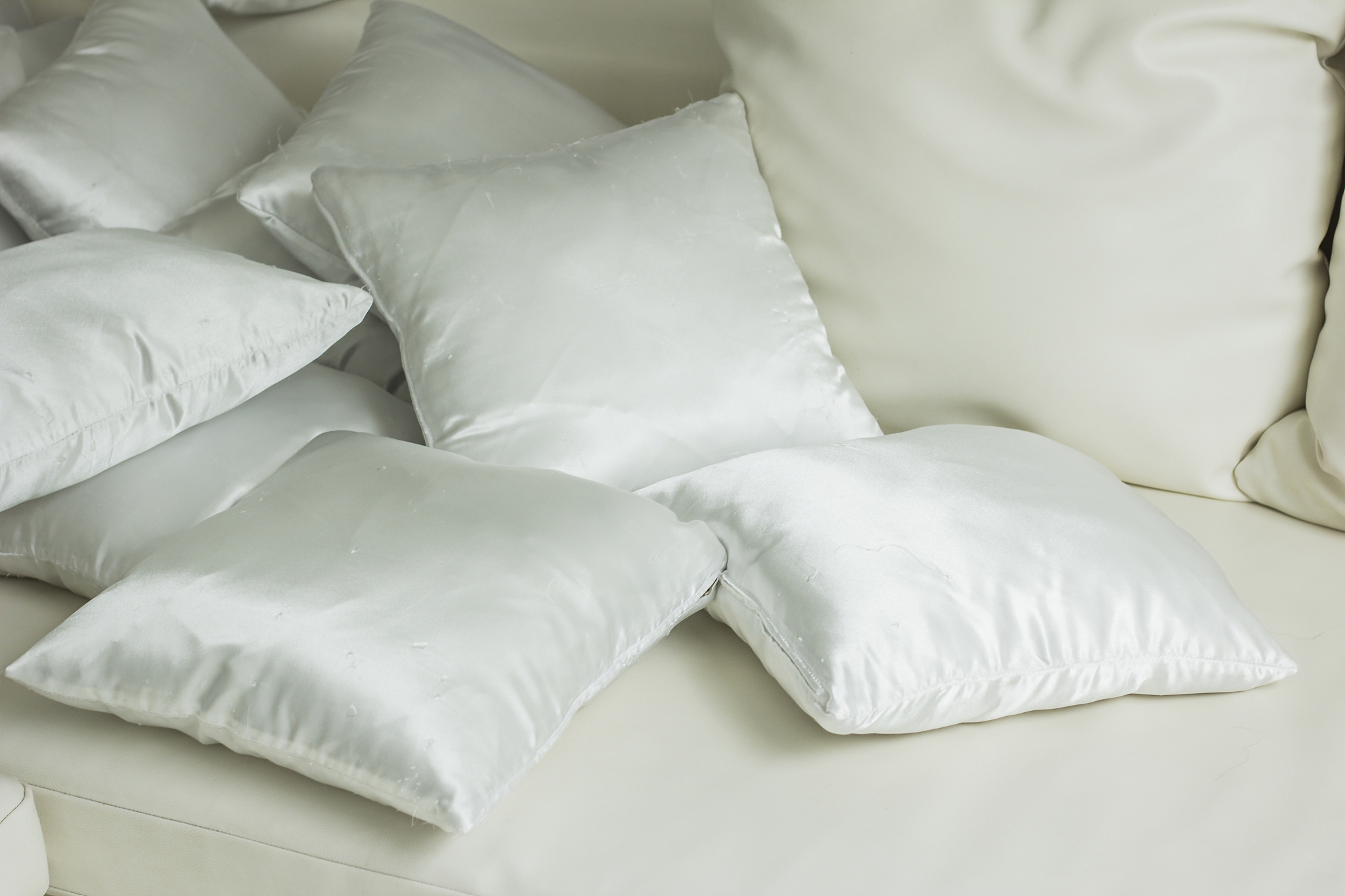 white pillows on a bed comfortable soft pillows