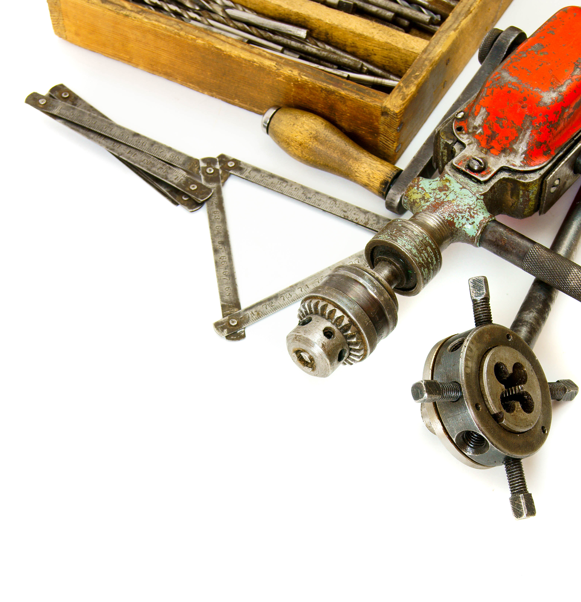 vintage working tools ( drill and more) on white background