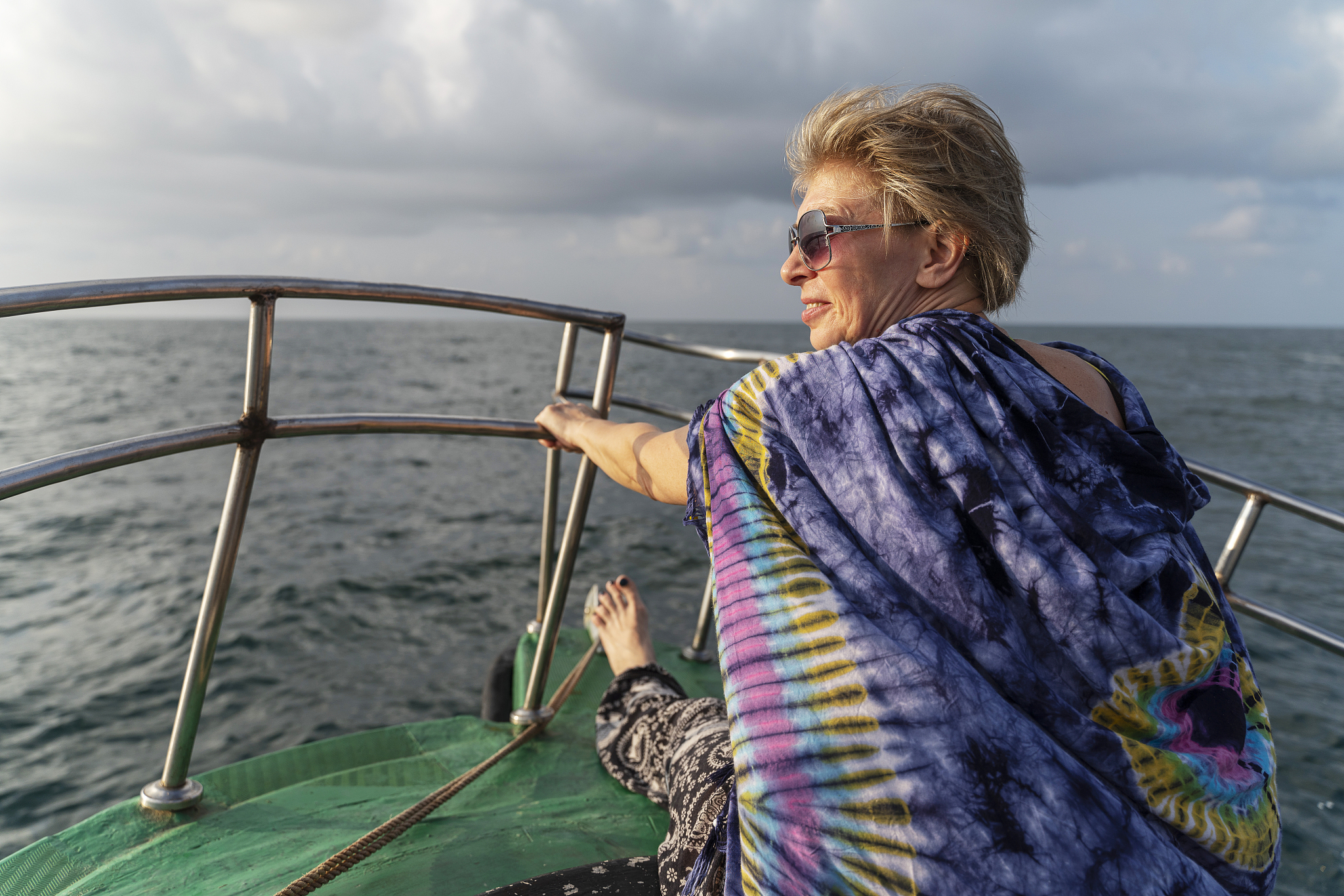 A Woman Fishing: A Serene Moment in Nature