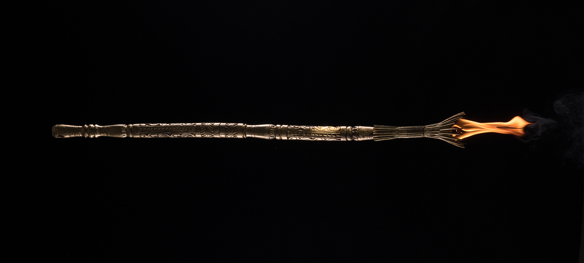 fire magic staff on a black background