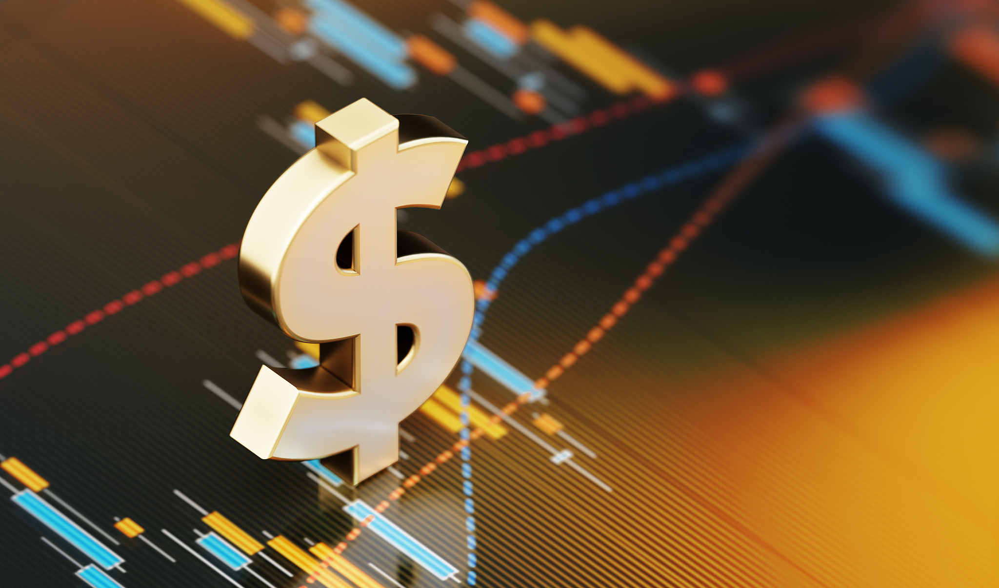 american dollar sign standing over a financial graph