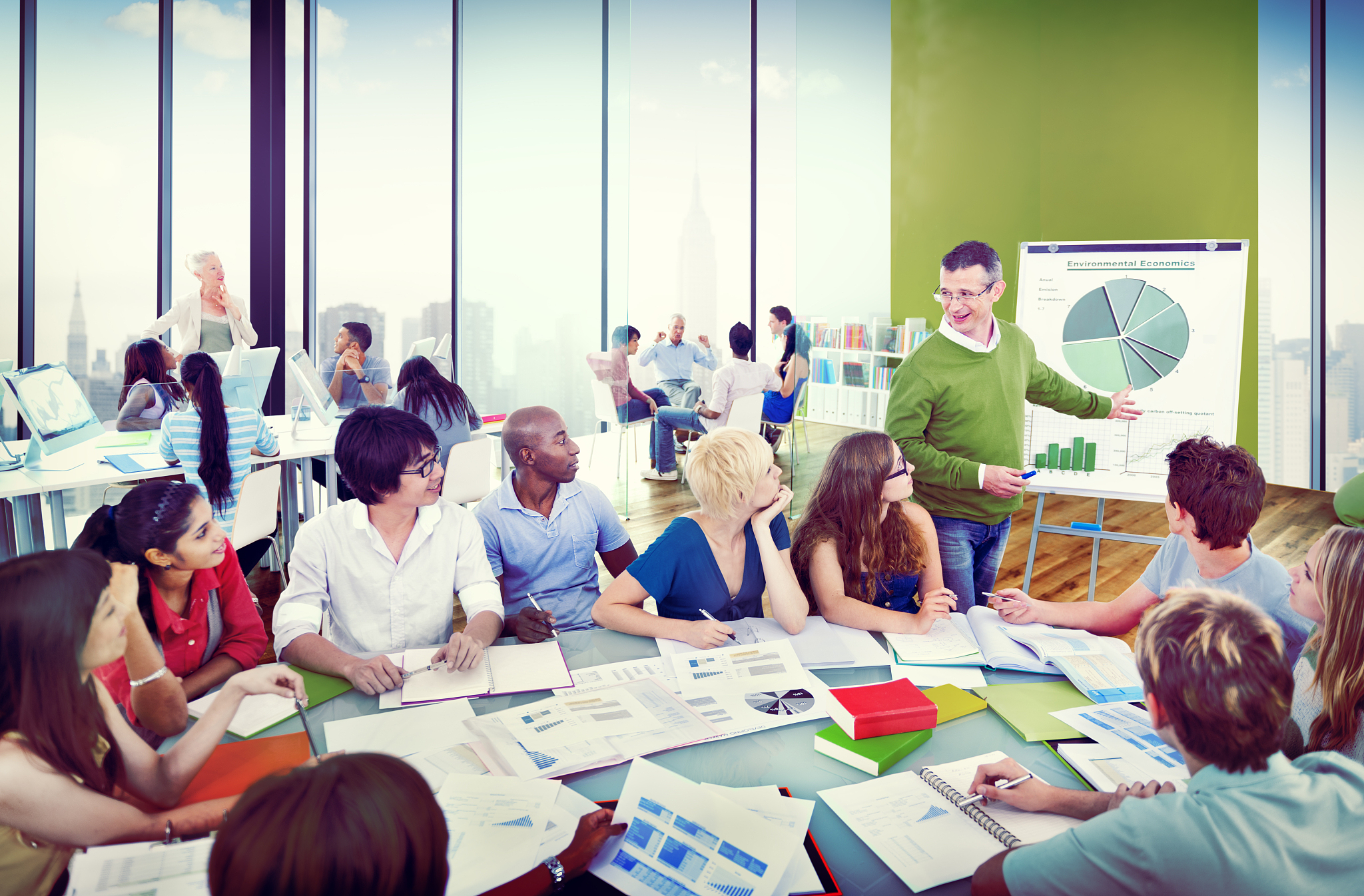 diverse students learning from the professor