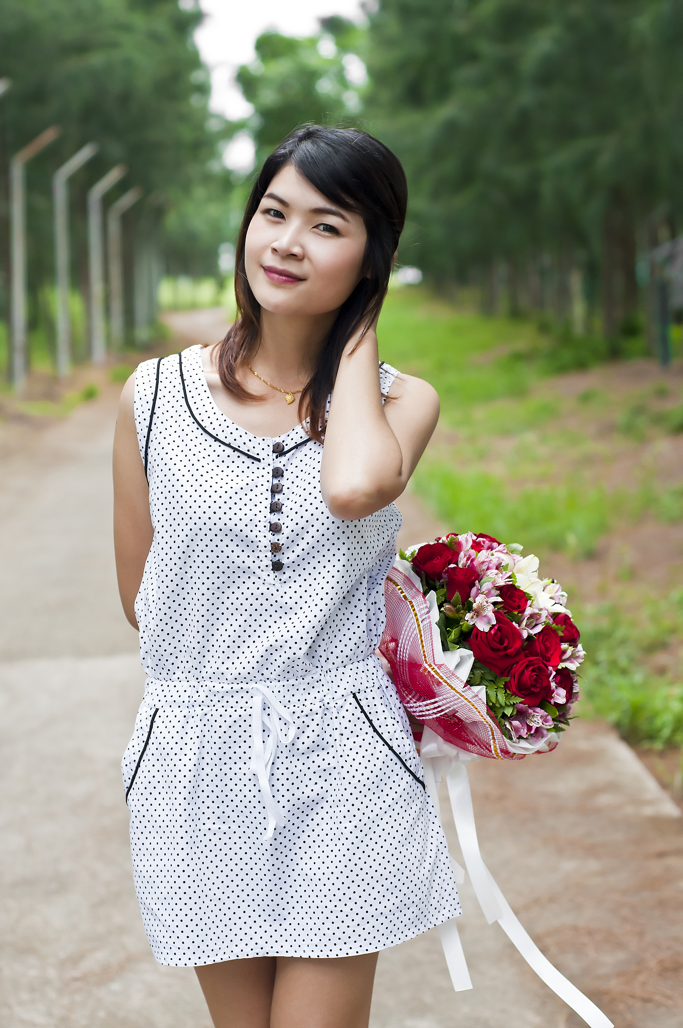beautiful asian woman and flower bouquet.