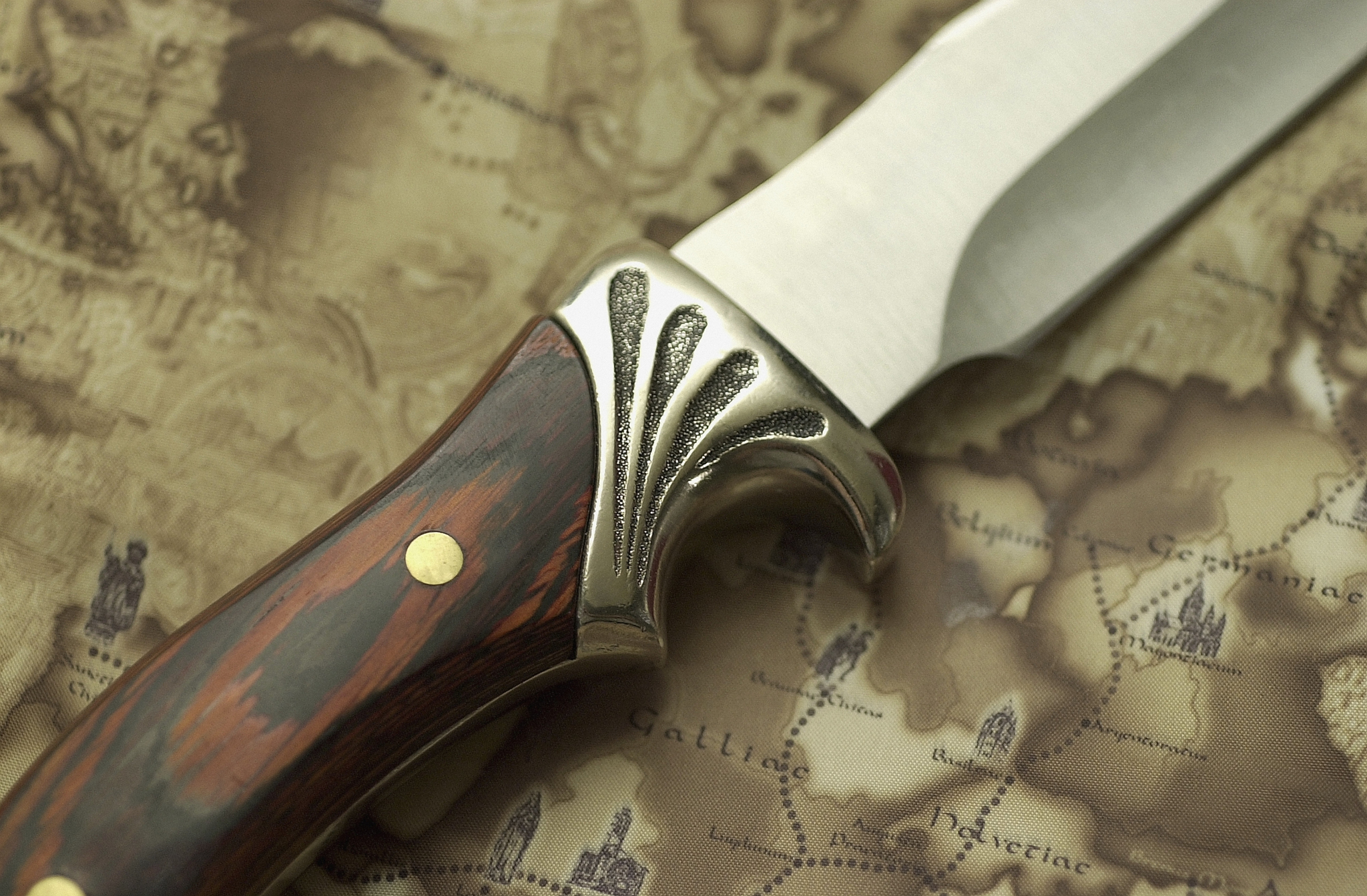 close-up of a knife on a map