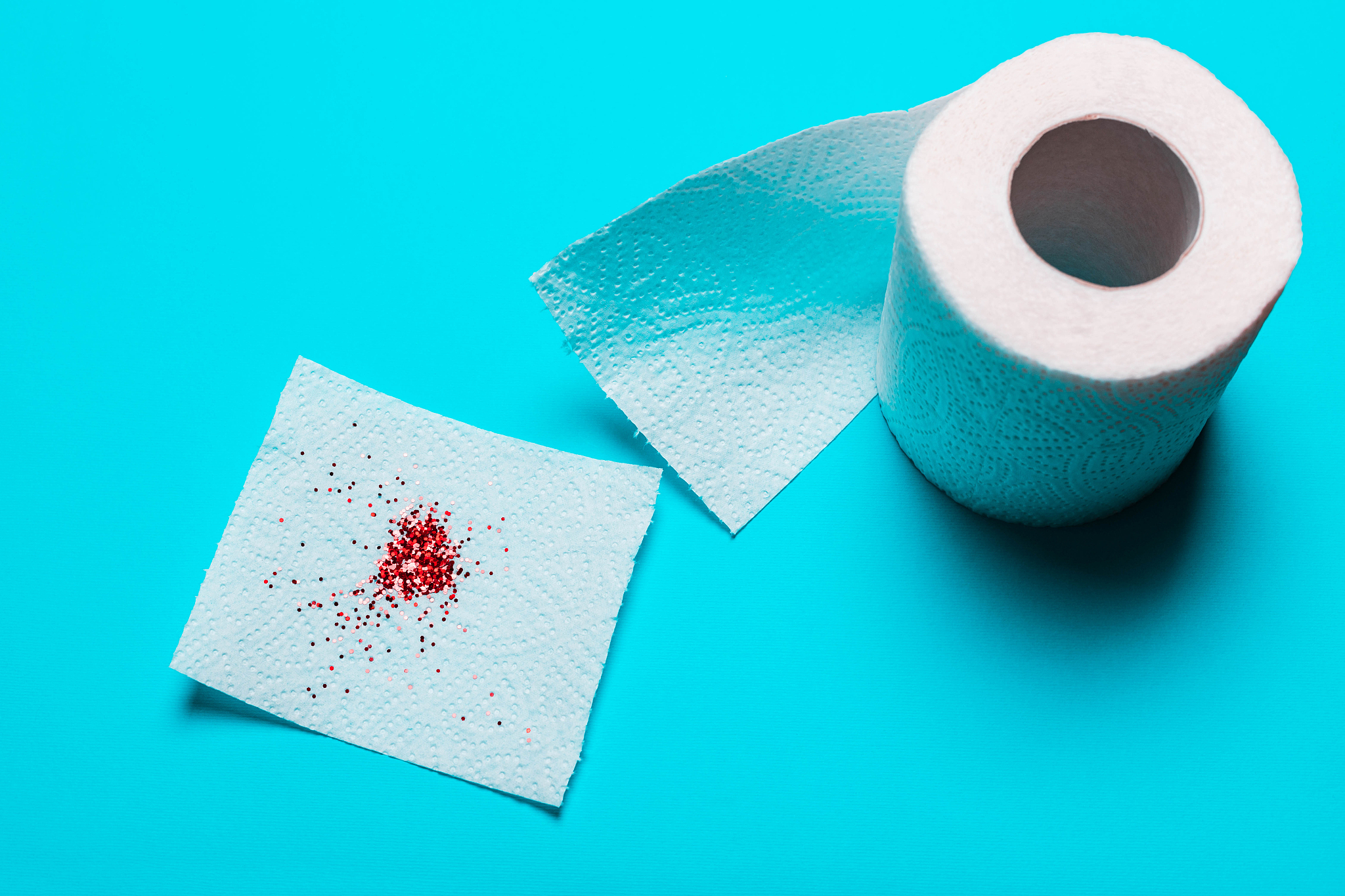 hemorrhoids treatment concept, toilet paper with blood